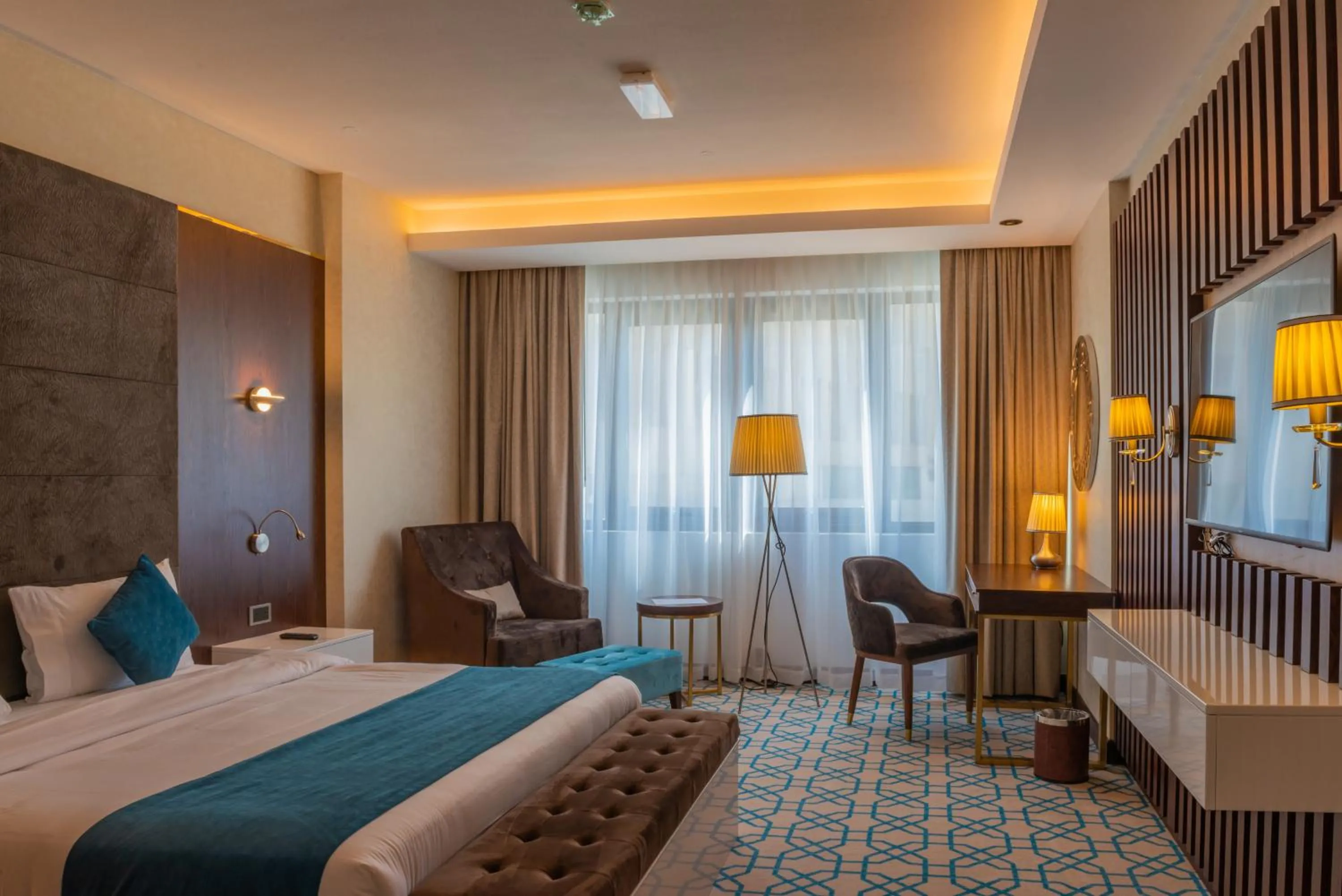 Bed in Royal Crown Hotel