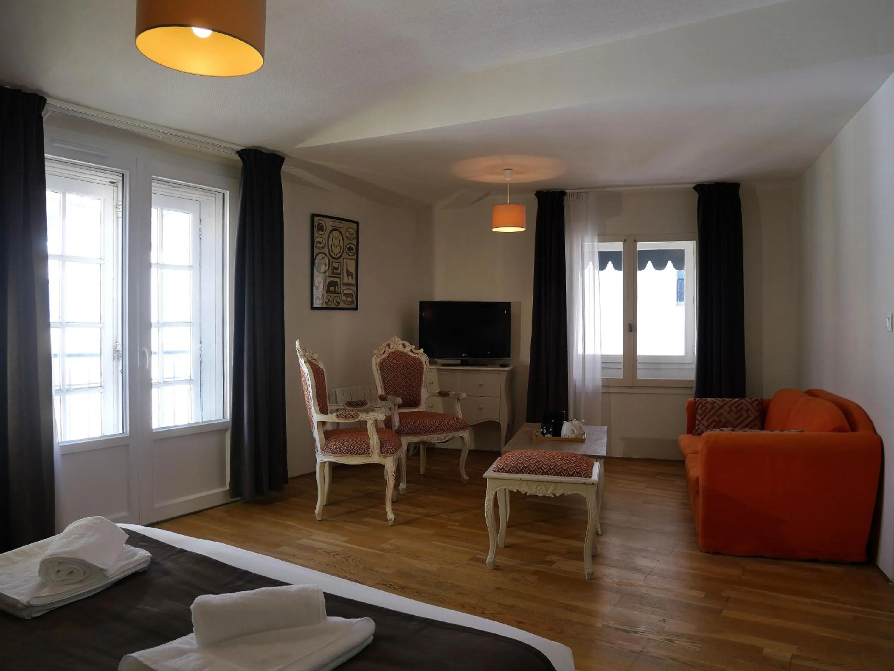 Bedroom in Hôtel De L'Amphithéâtre