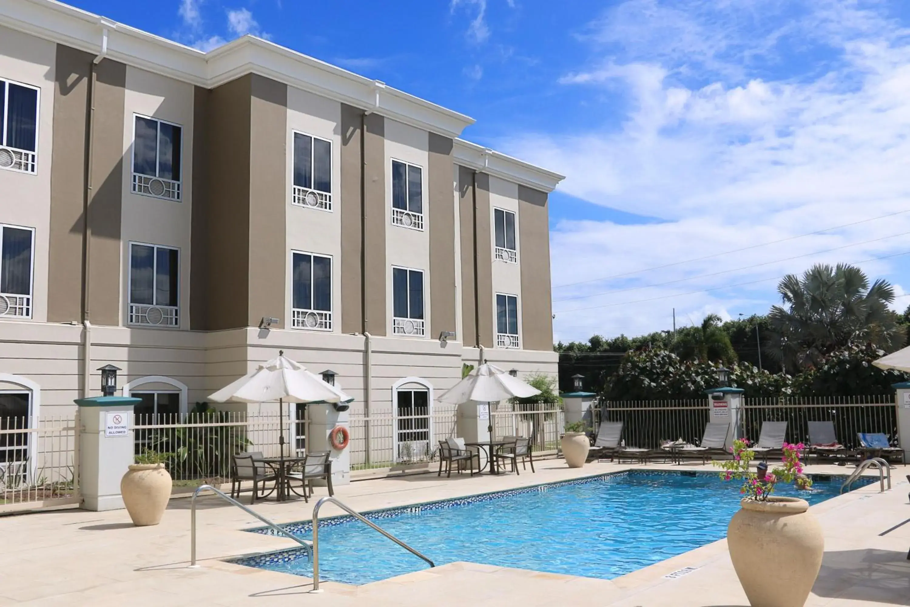 Swimming pool in Holiday Inn Express Trincity by IHG Swimming pool in Holiday Inn Express Trincity by IHG