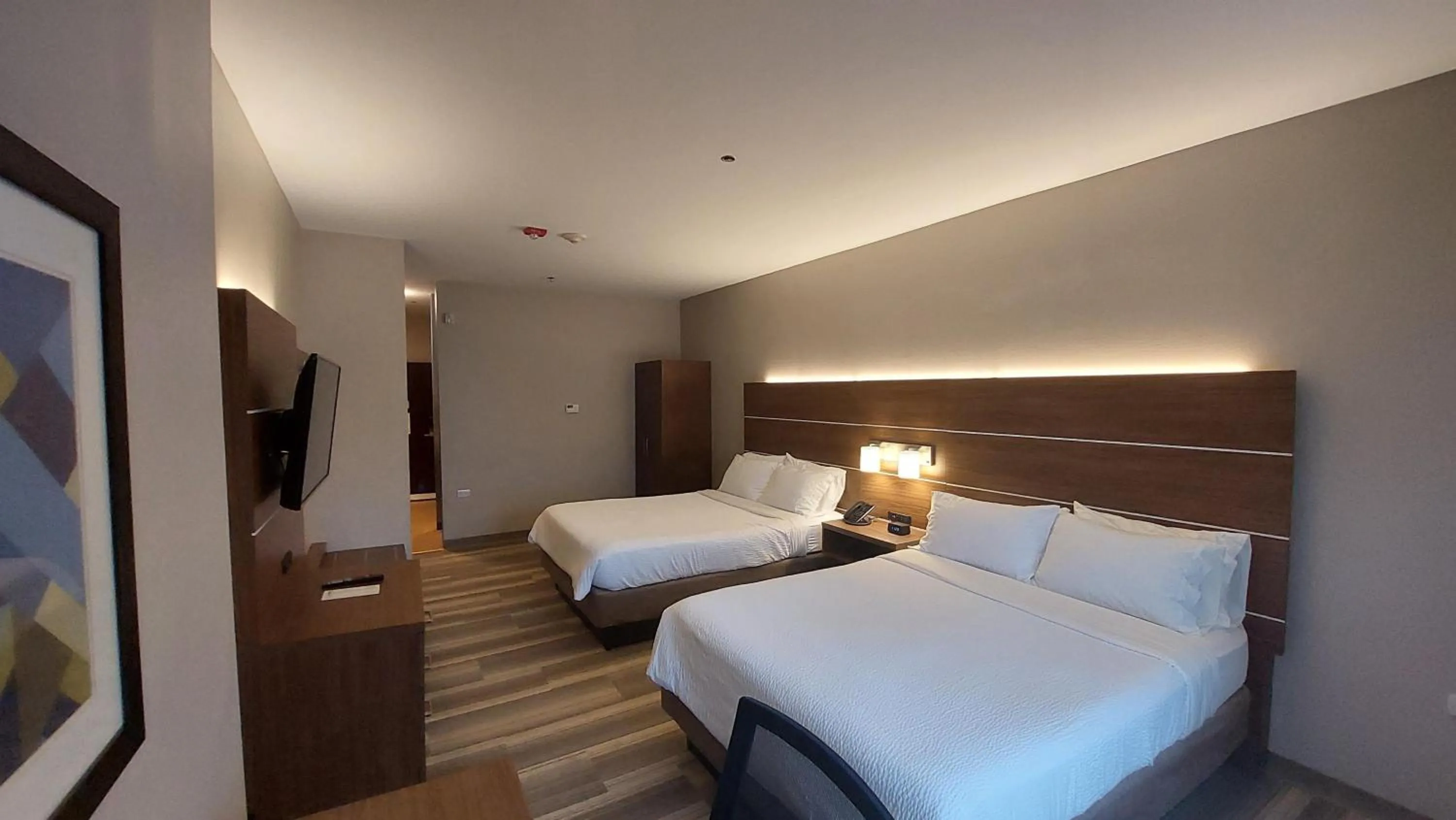 Photo of the whole room, Bed in Holiday Inn Express Trincity by IHG