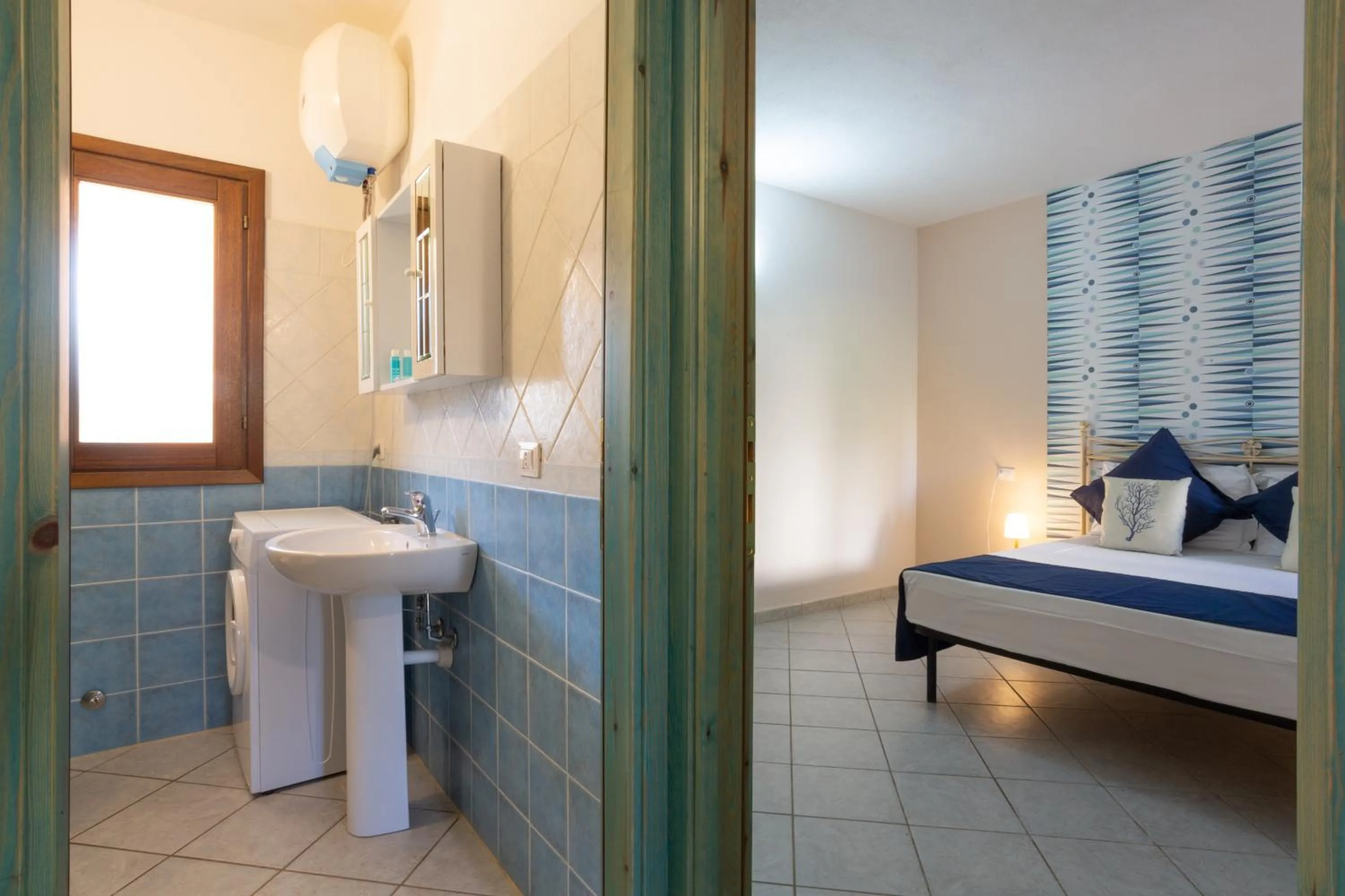 Bathroom, Bed in Appartamenti Tanaunella