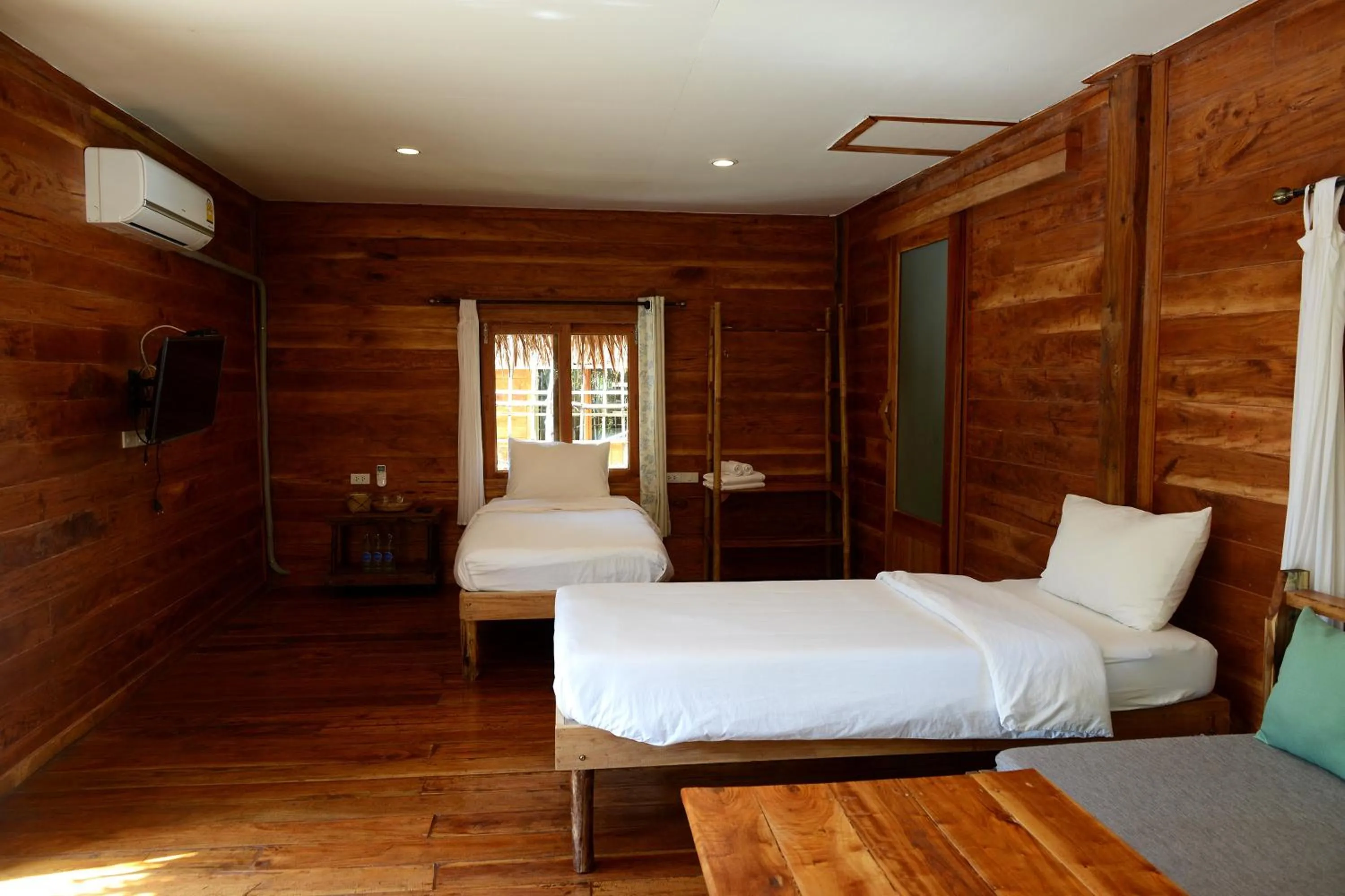 Bed in Baan​ Tonlamphu​ Pakpra