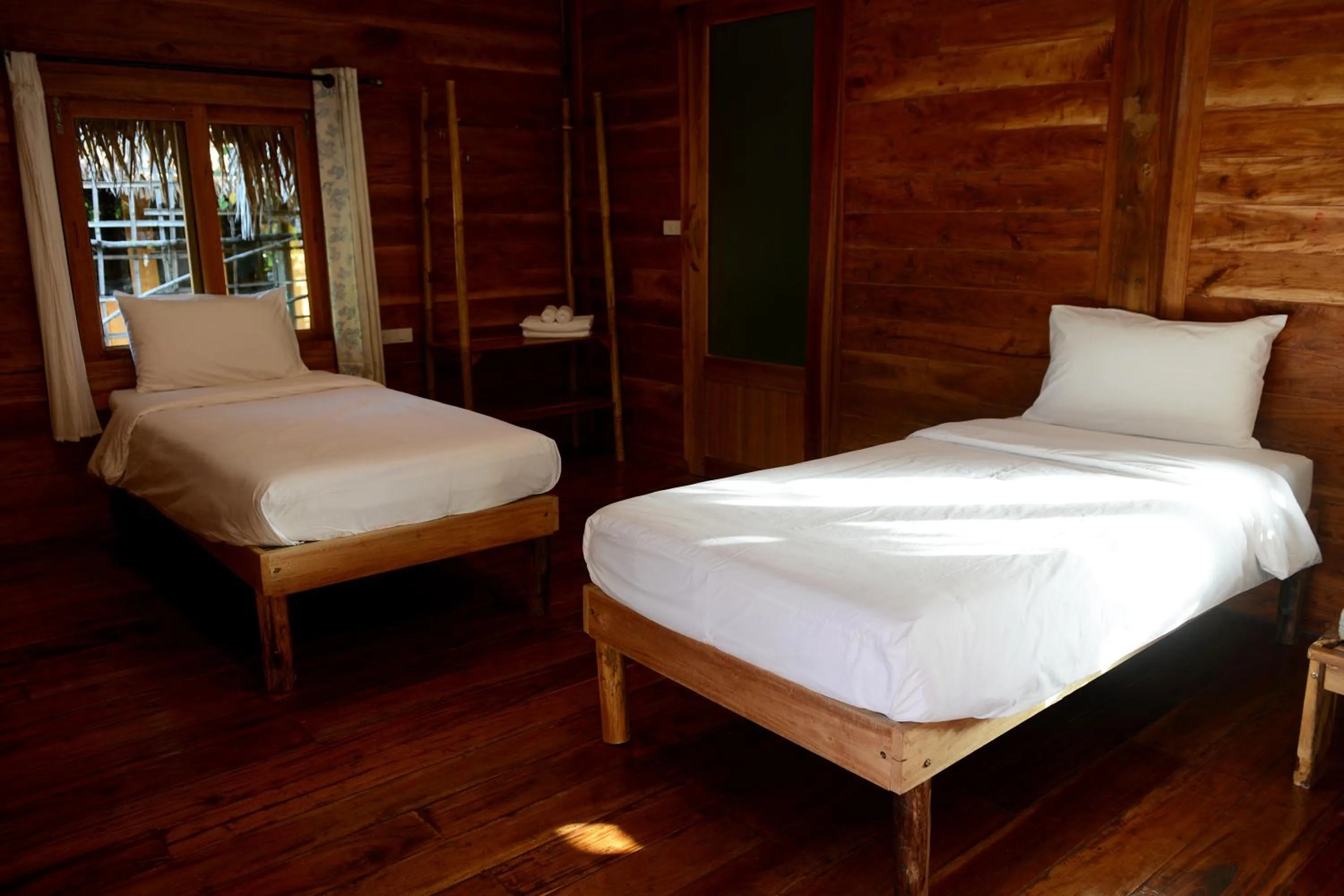 Bed in Baan​ Tonlamphu​ Pakpra