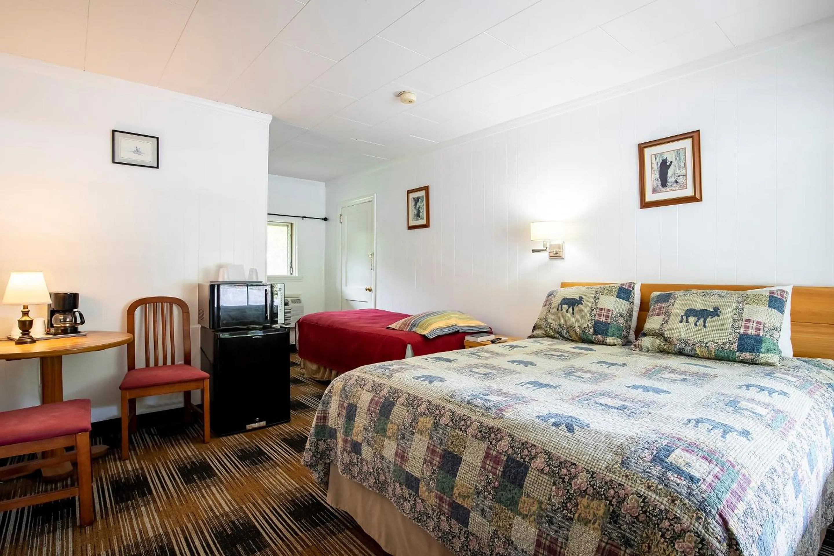 Bedroom, Bed in Lloyd's On The River Country Inn By Oyo