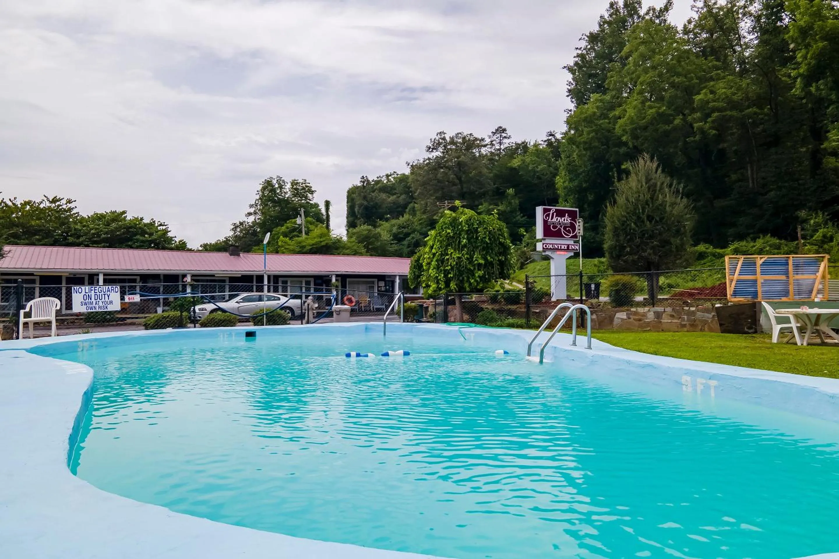 Swimming pool in Lloyd's On The River Country Inn By Oyo