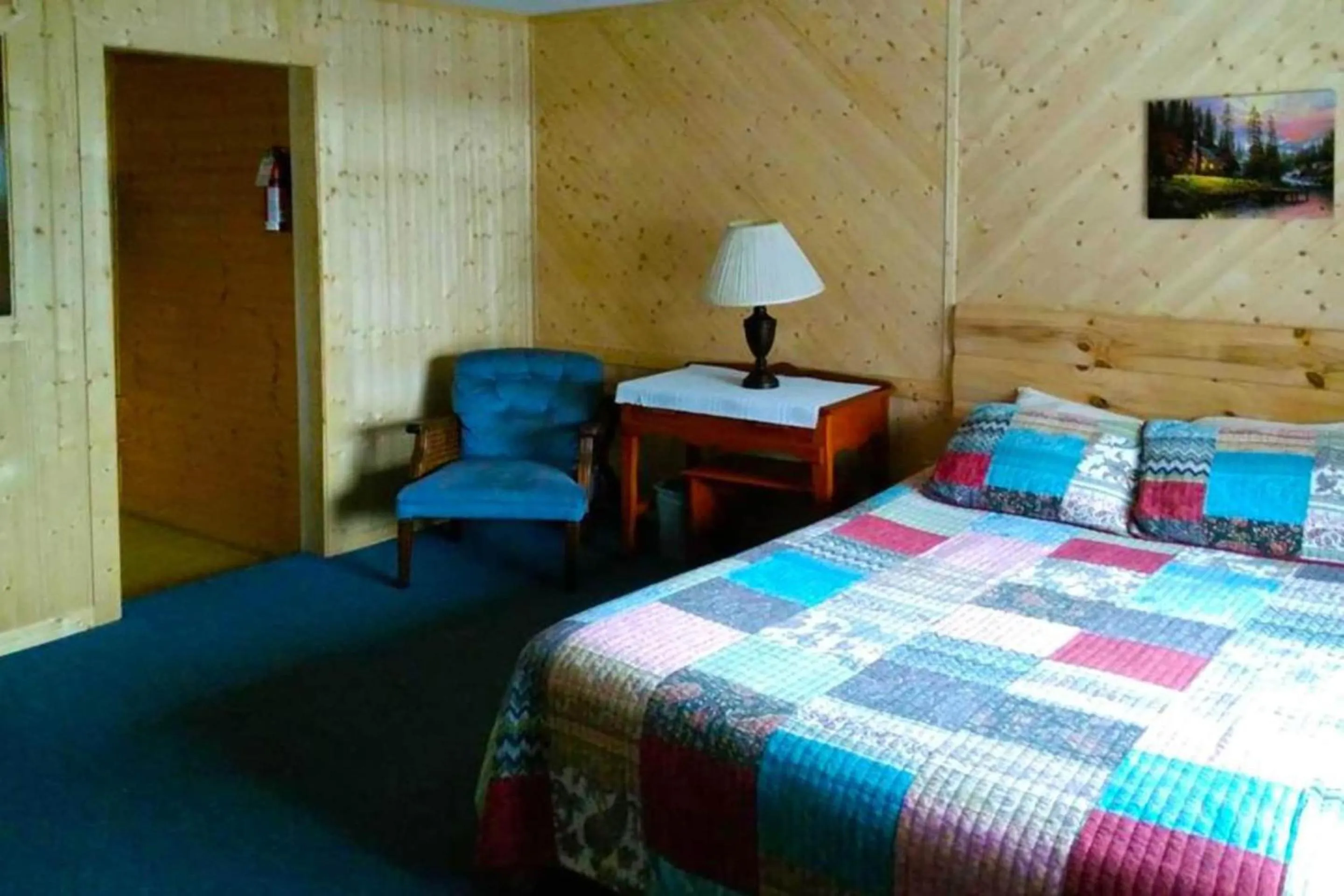 Bedroom, Bed in Lloyd's On The River Country Inn By Oyo