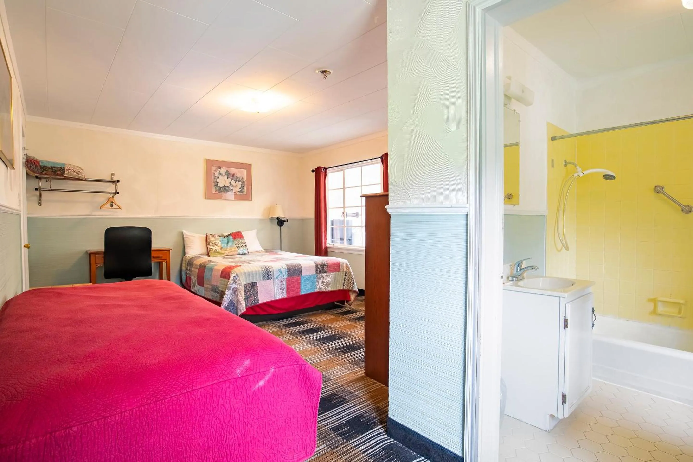 Bedroom, Bed in Lloyd's On The River Country Inn By Oyo