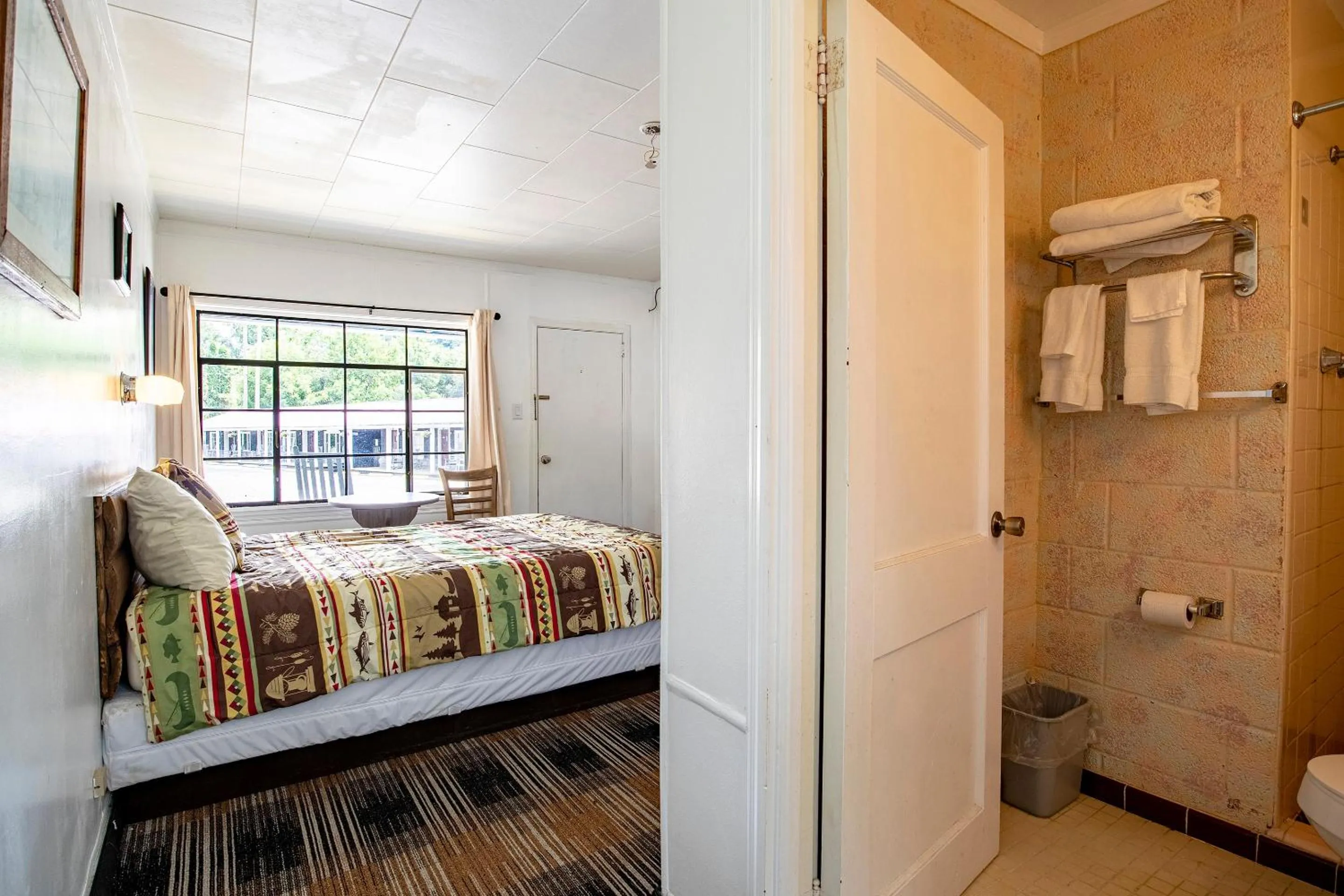 Bedroom, Bed in Lloyd's On The River Country Inn By Oyo