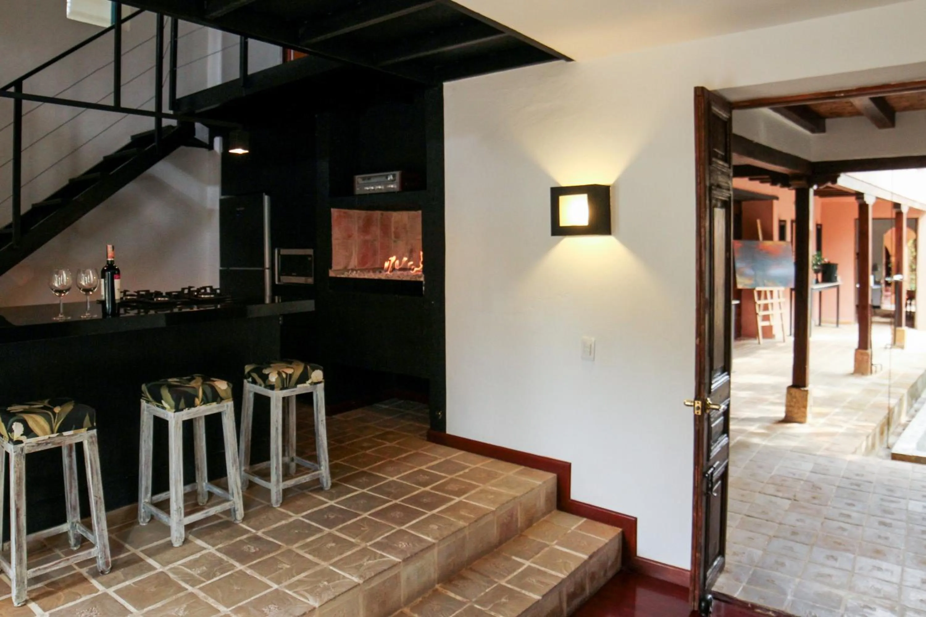 fireplace, Bed in Hotel Plazuela de San Agustín - PSA Hotel