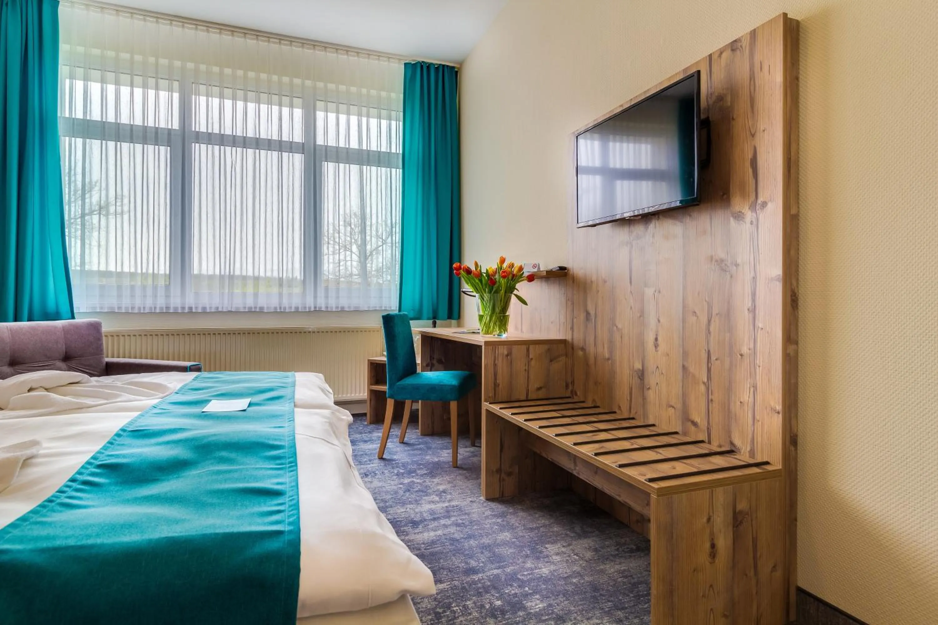 Photo of the whole room, Bed in Panorama Ferien Hotel Harz