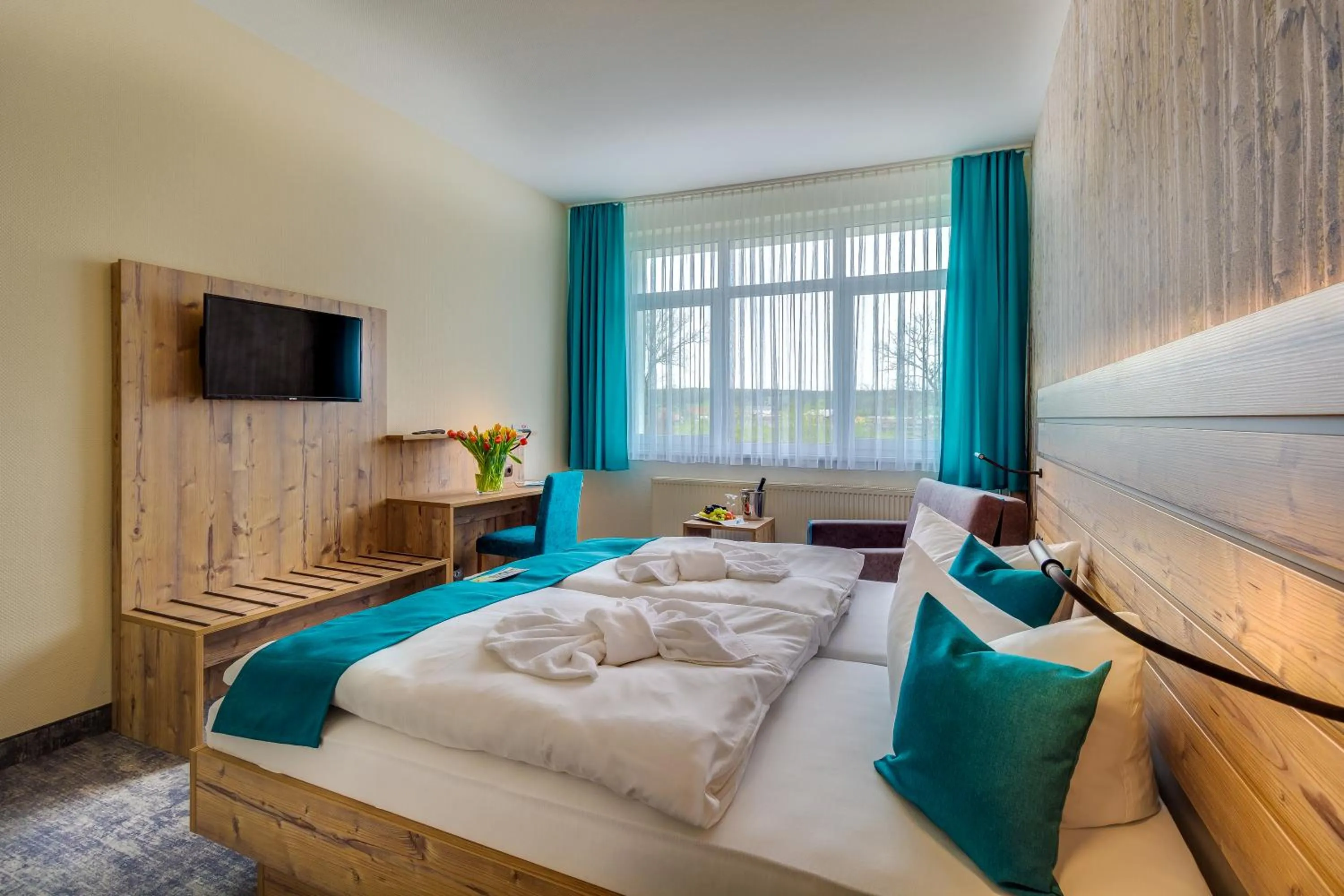 Photo of the whole room, Bed in Panorama Ferien Hotel Harz