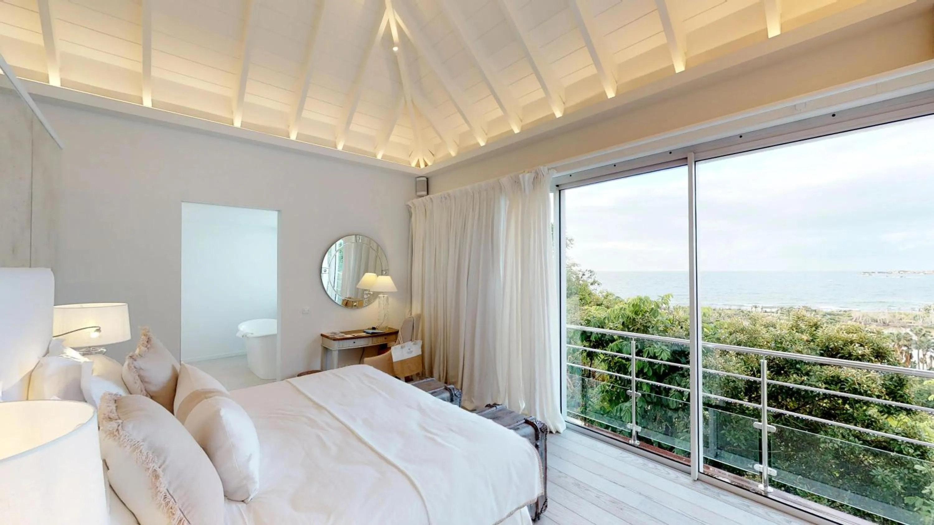 Photo of the whole room, Bed in Le Toiny Hotel & Beach Club