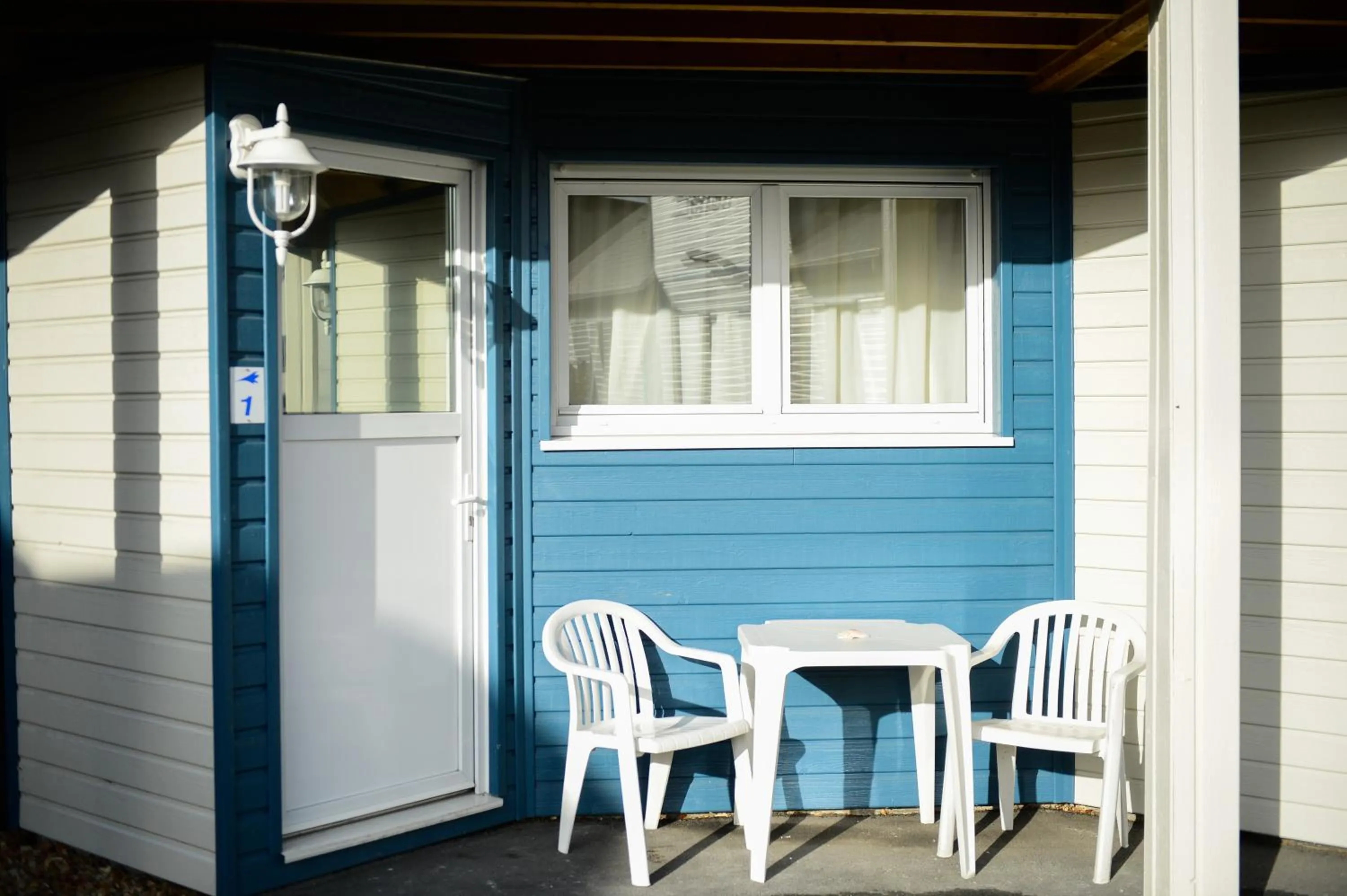 Balcony/Terrace in Contact hôtel - Hôtel Les Bleuets & SPA