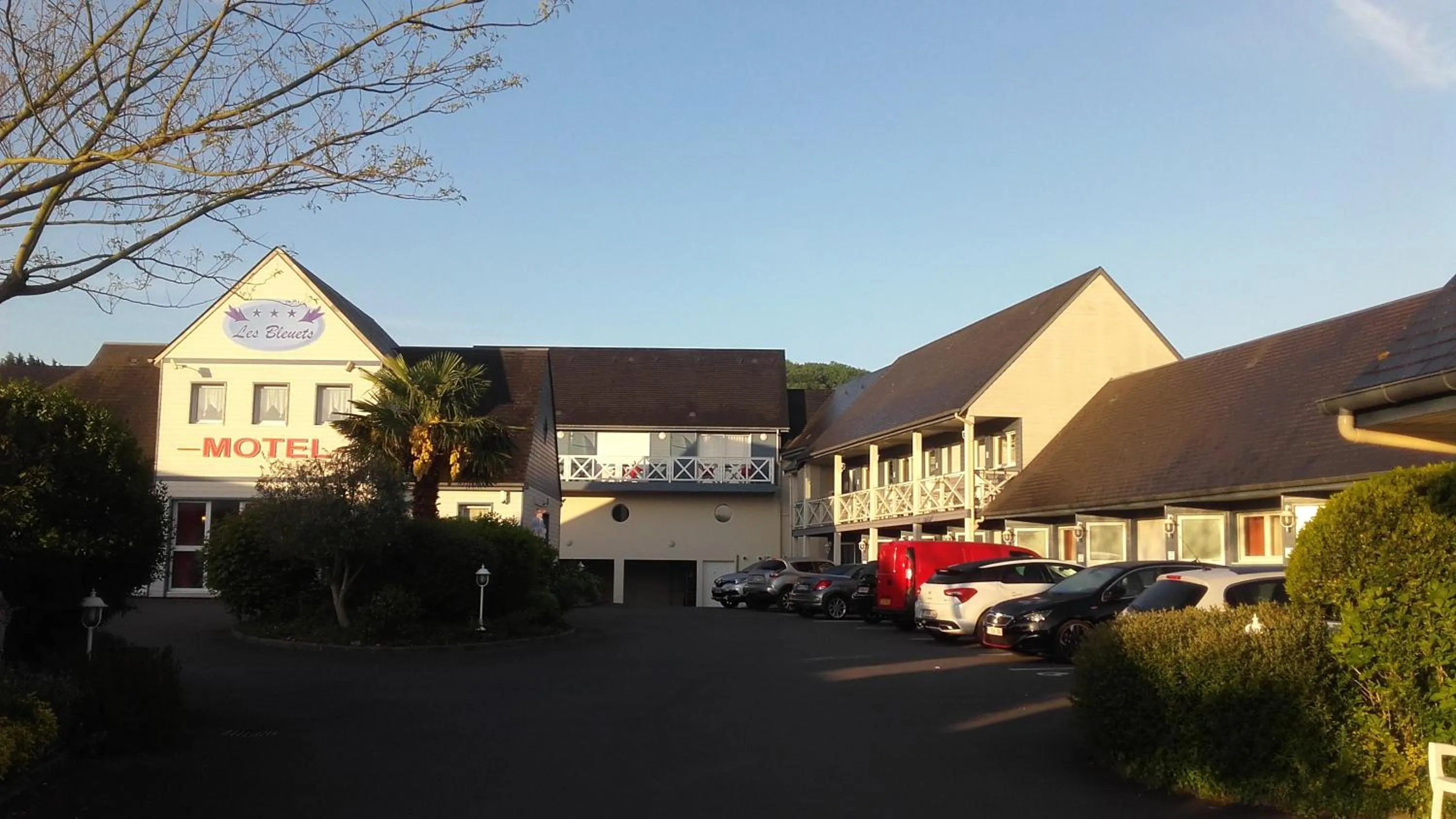 Property building in Contact hôtel - Hôtel Les Bleuets & SPA