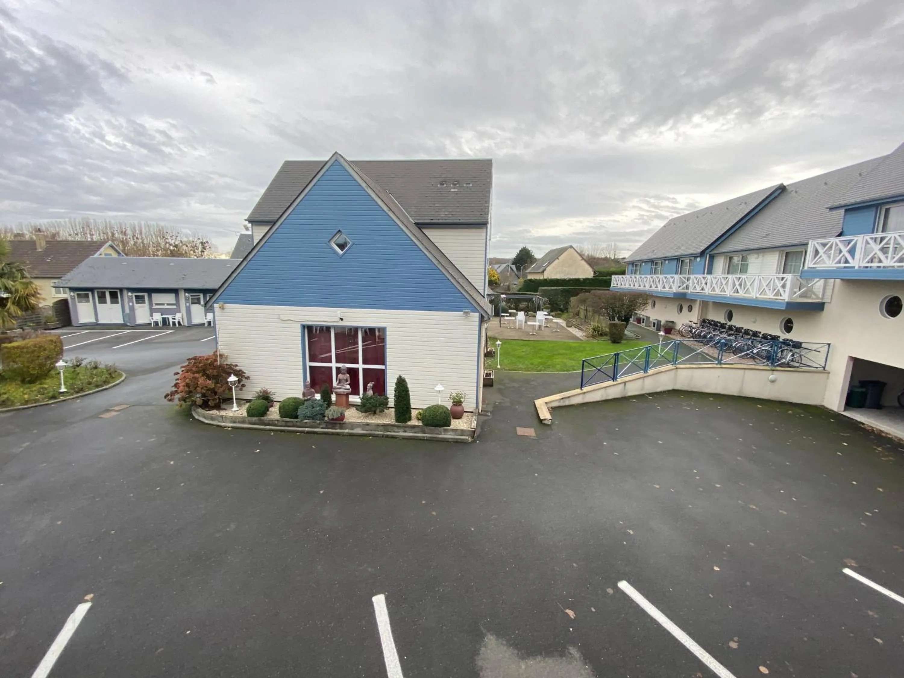 Property building in Contact hôtel - Hôtel Les Bleuets & SPA