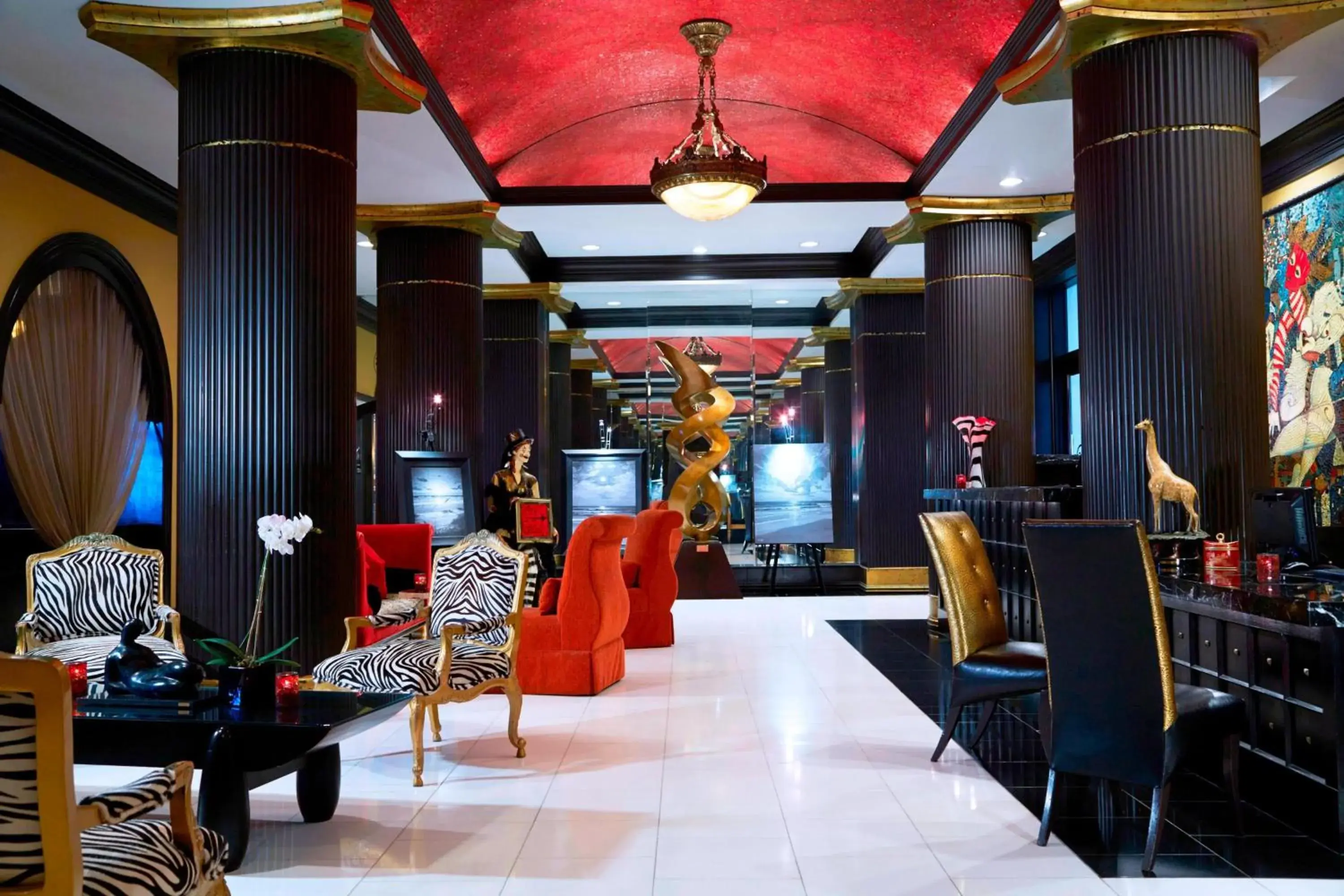 Lobby or reception in Grand Bohemian Orlando, Autograph Collection Lobby or reception in Grand Bohemian Orlando, Autograph Collection