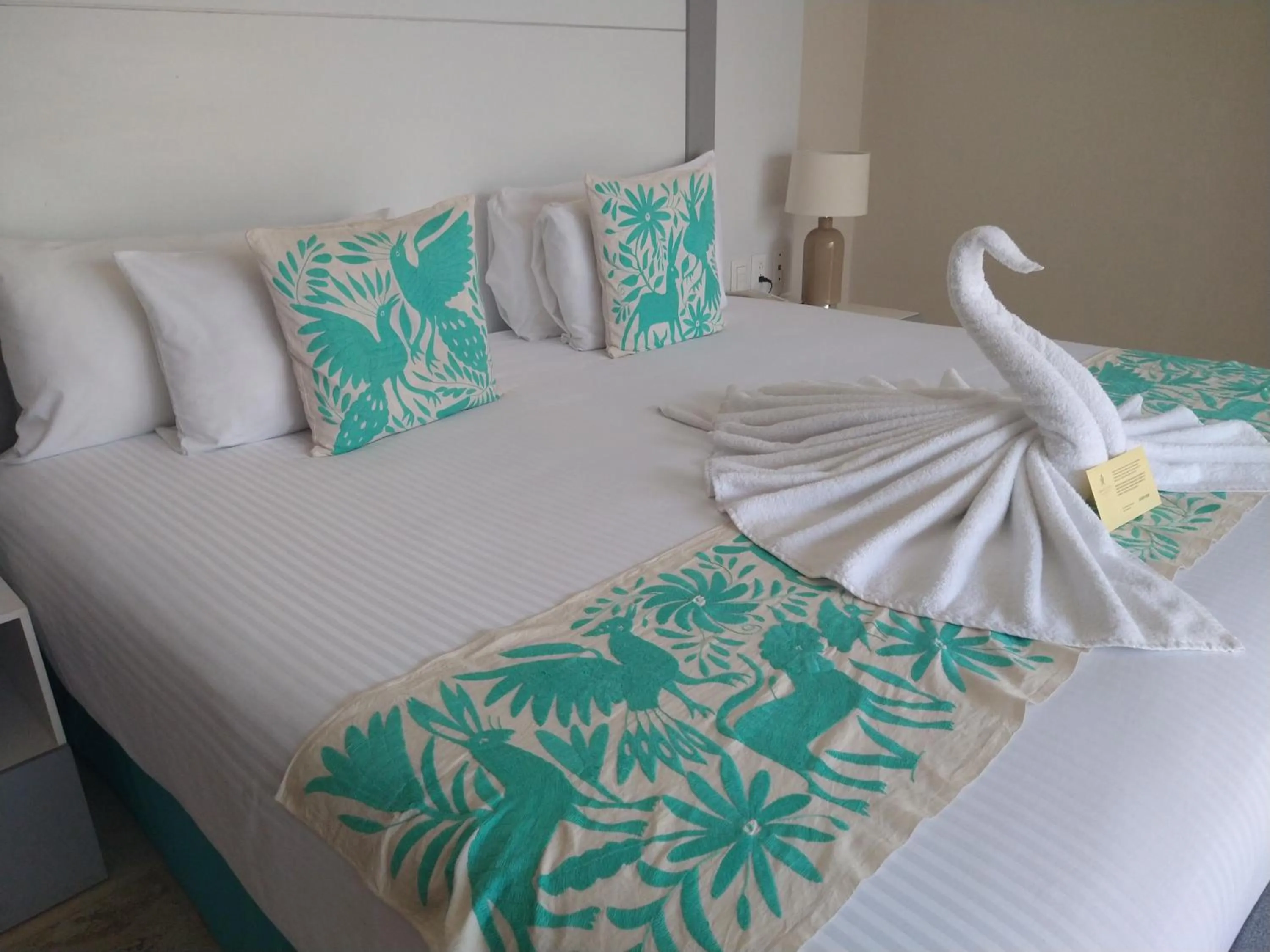 Bed in Xaha Villas Suites & Golf Resort