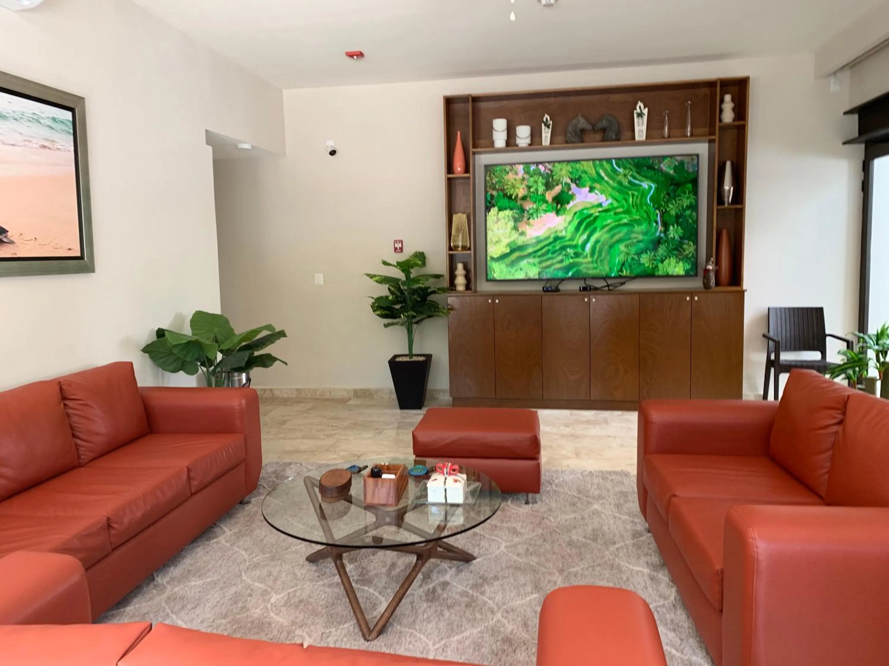 Communal lounge/ TV room in Xaha Villas Suites & Golf Resort