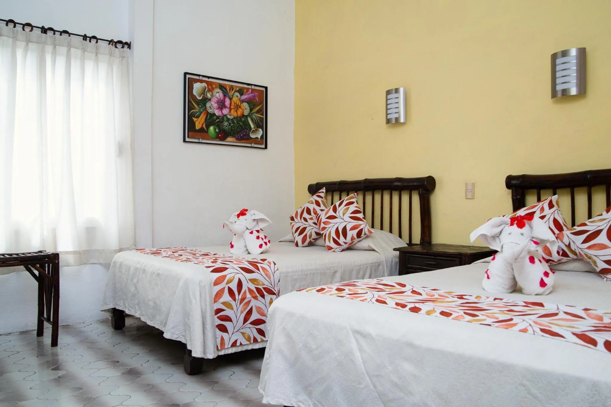 Bed in Hotel Zihua Caracol