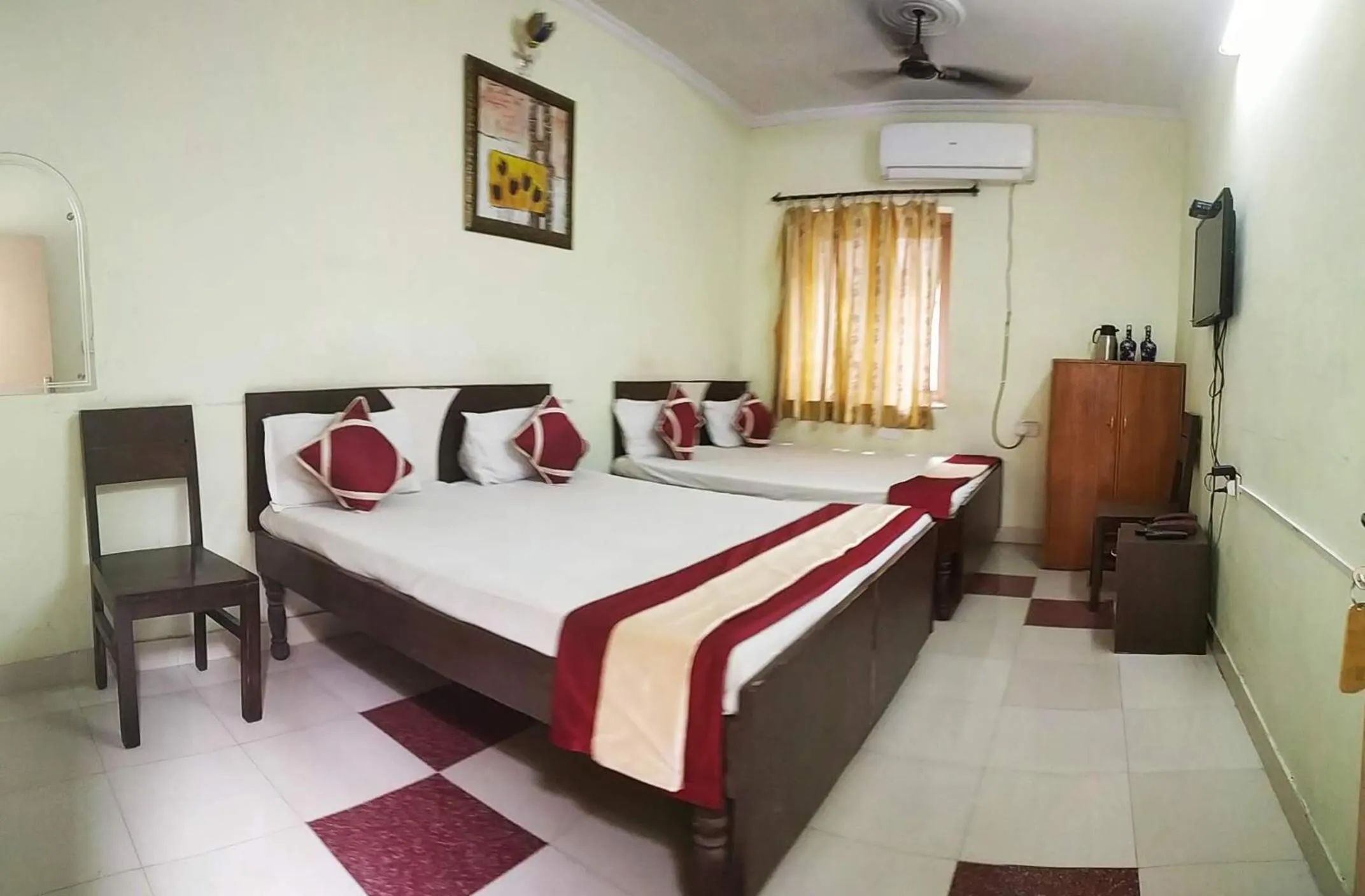 Bed in Satkar Hotel