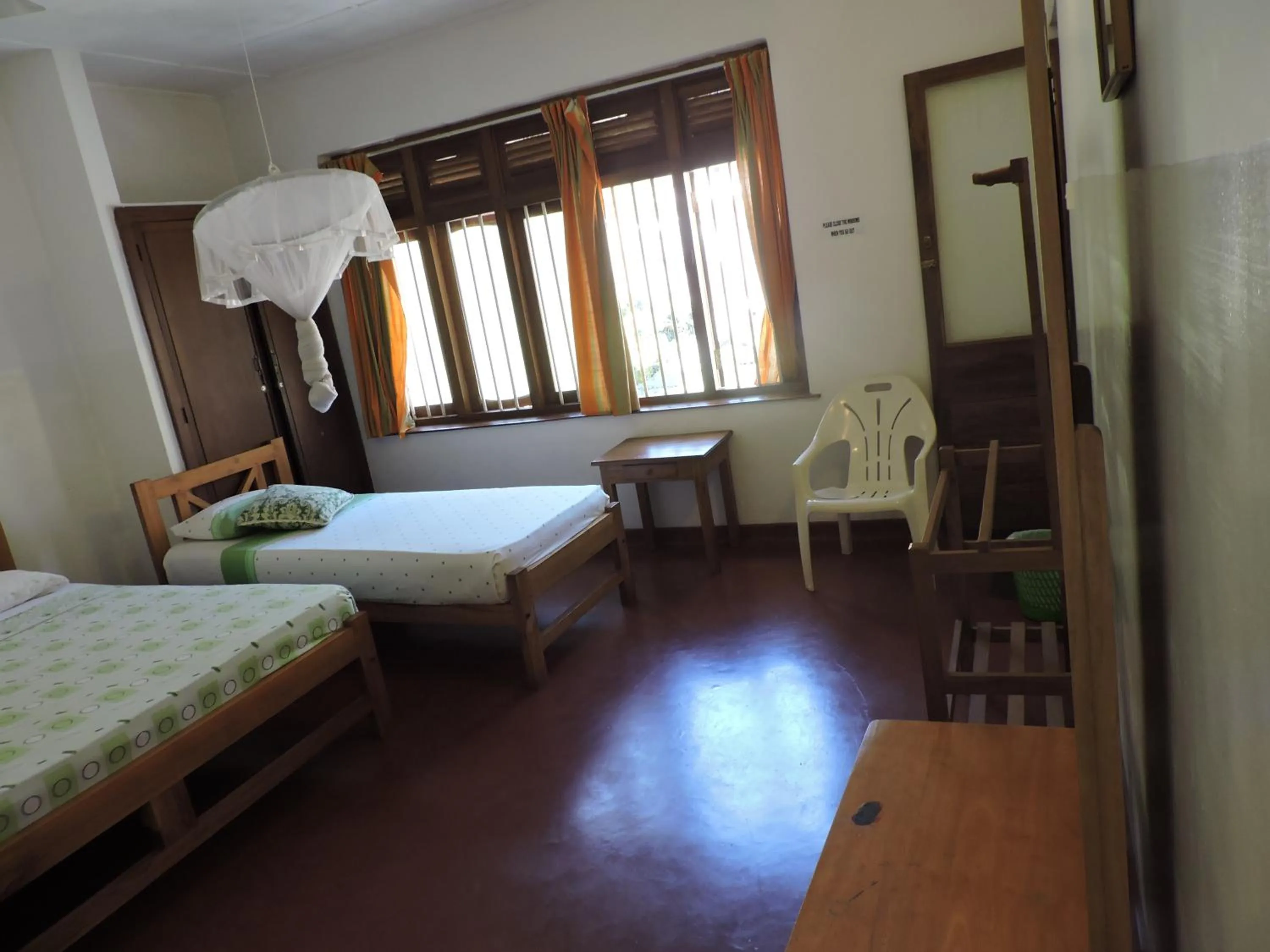 Photo of the whole room, Bed in Hotel Mango Garden