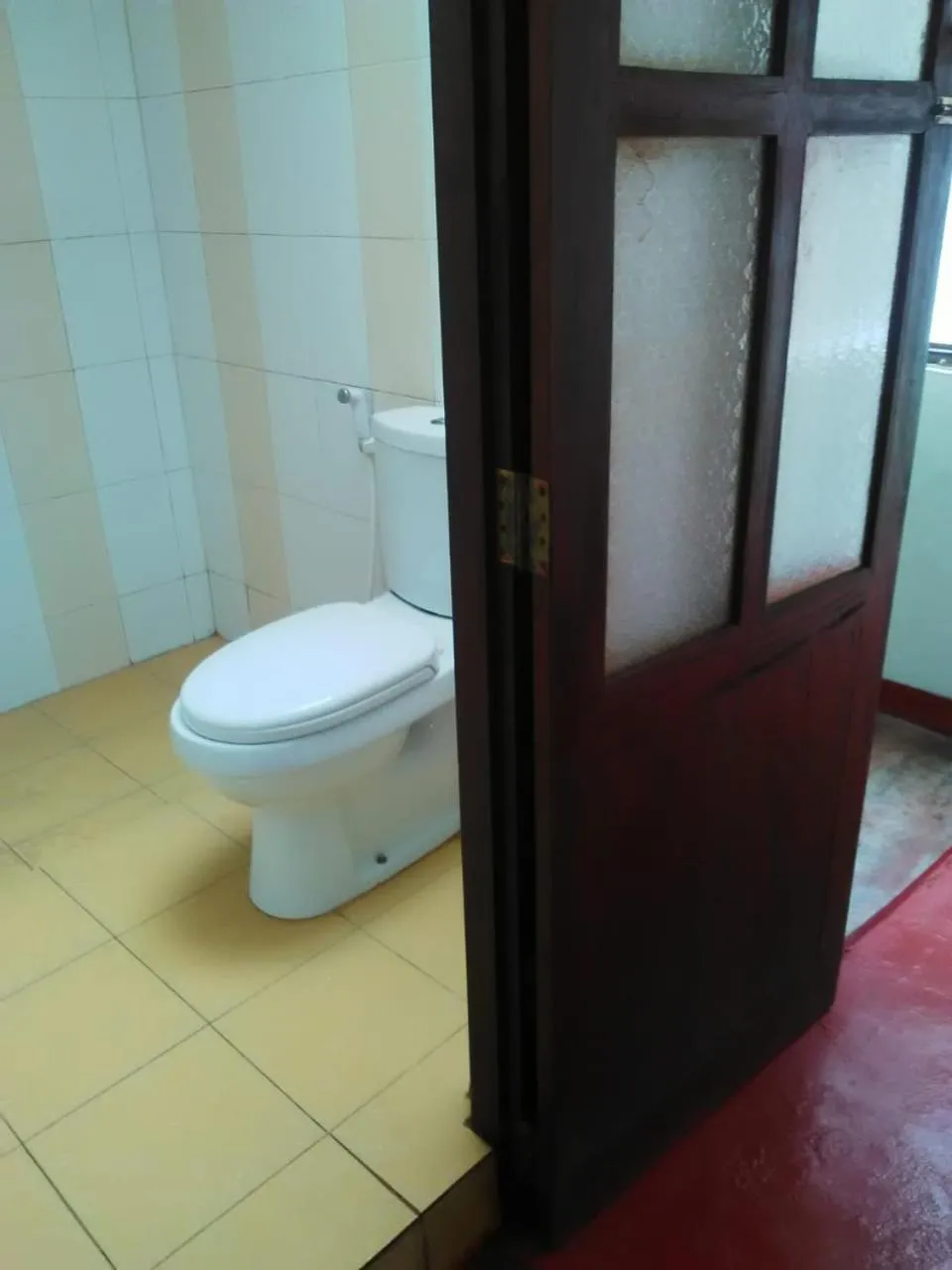Toilet in Hotel Mango Garden