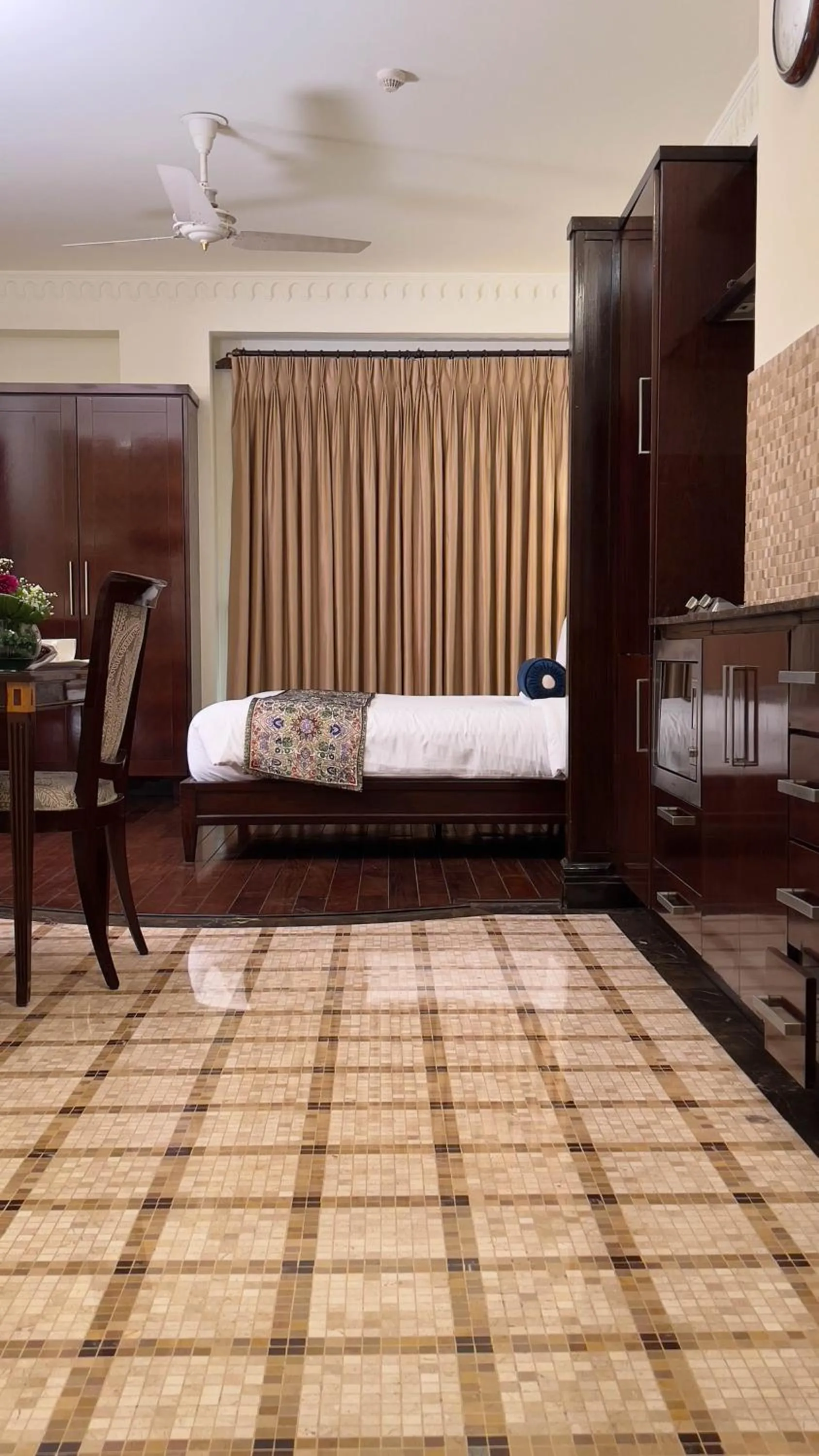 Bed in Heritage Luxury Suites All Suite Hotel