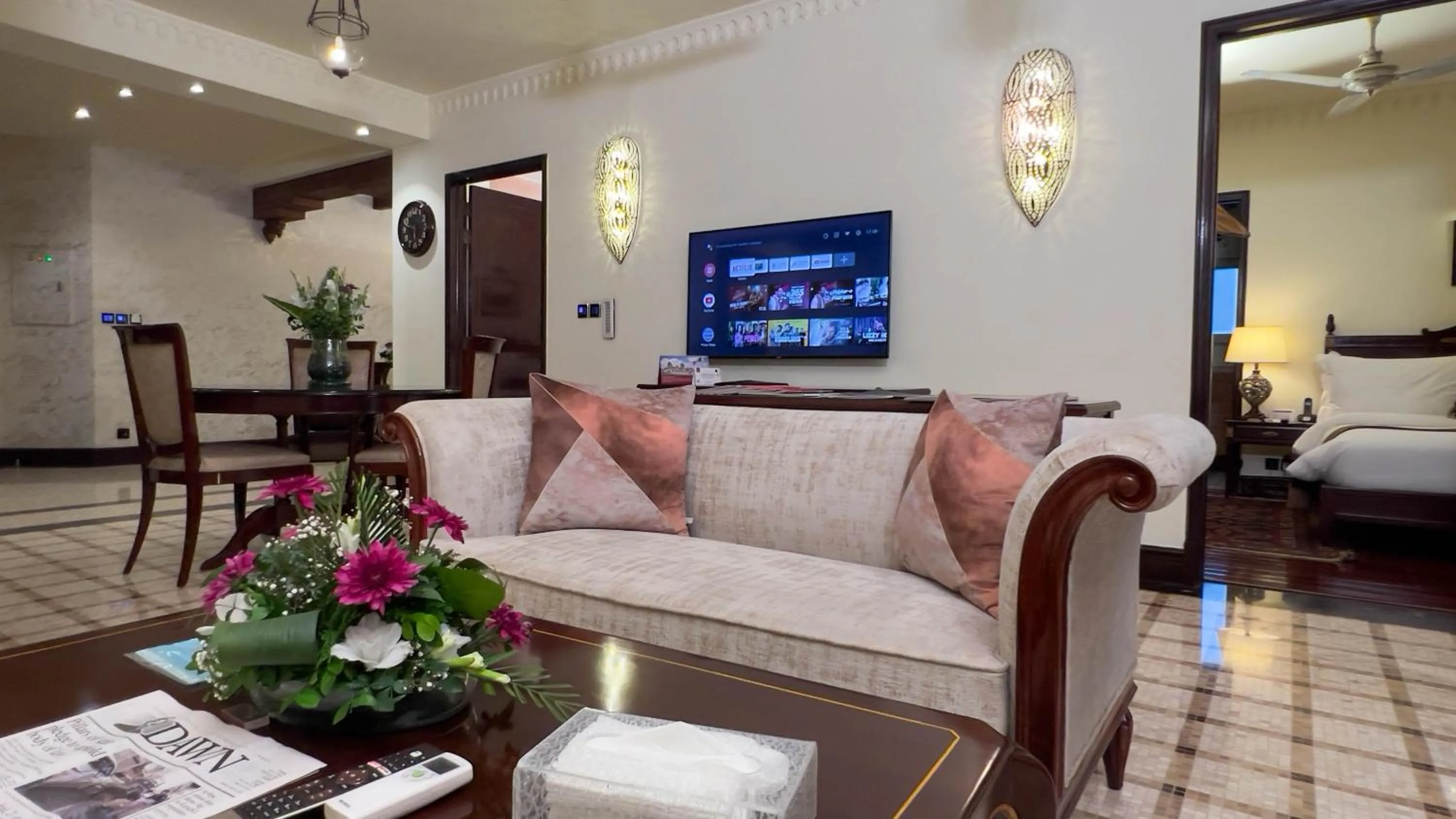 TV and multimedia in Heritage Luxury Suites All Suite Hotel