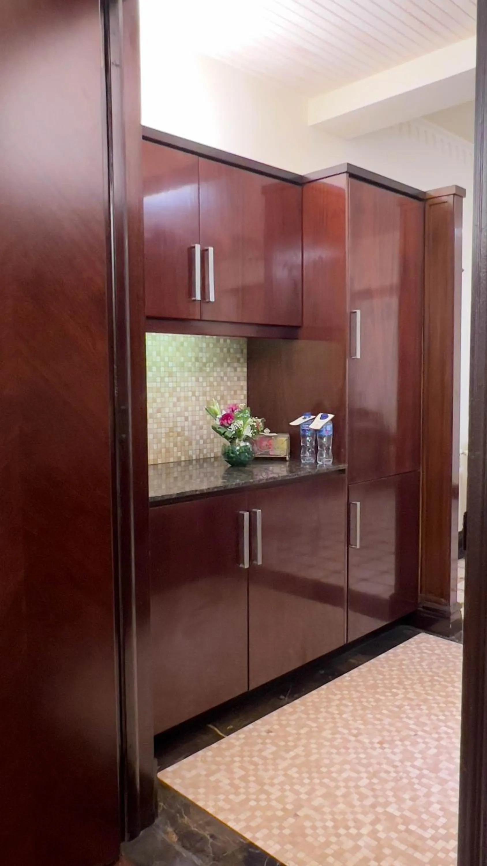 Kitchen or kitchenette in Heritage Luxury Suites All Suite Hotel