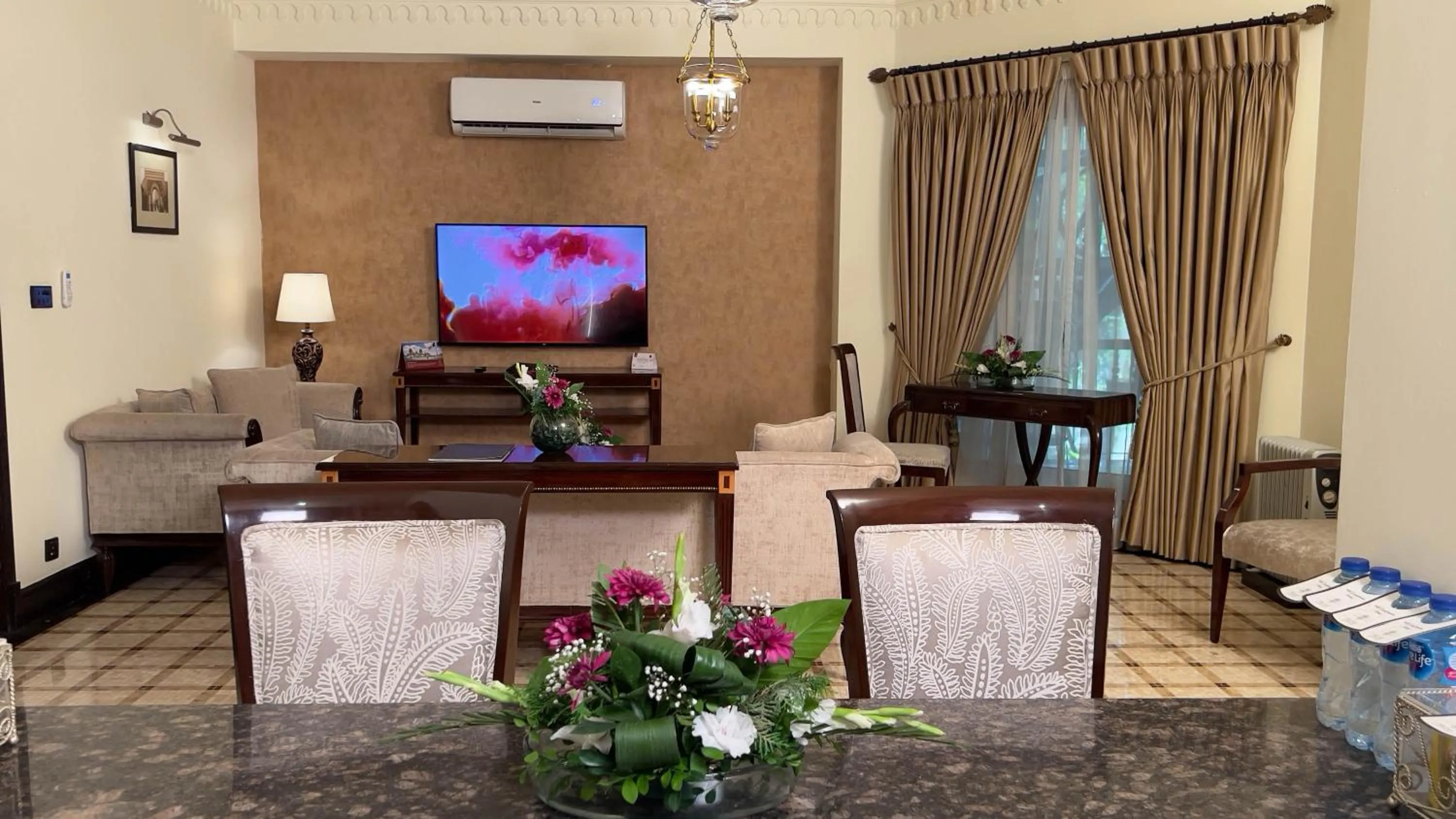 TV and multimedia in Heritage Luxury Suites All Suite Hotel