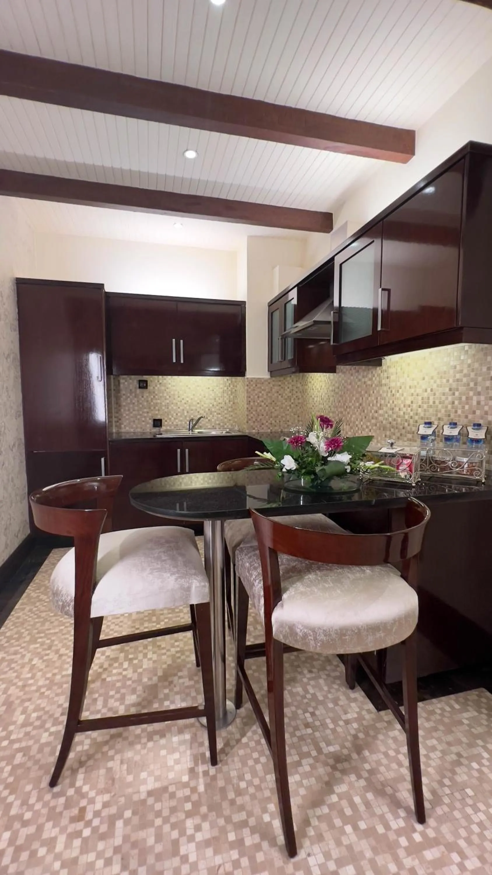 Kitchen or kitchenette in Heritage Luxury Suites All Suite Hotel