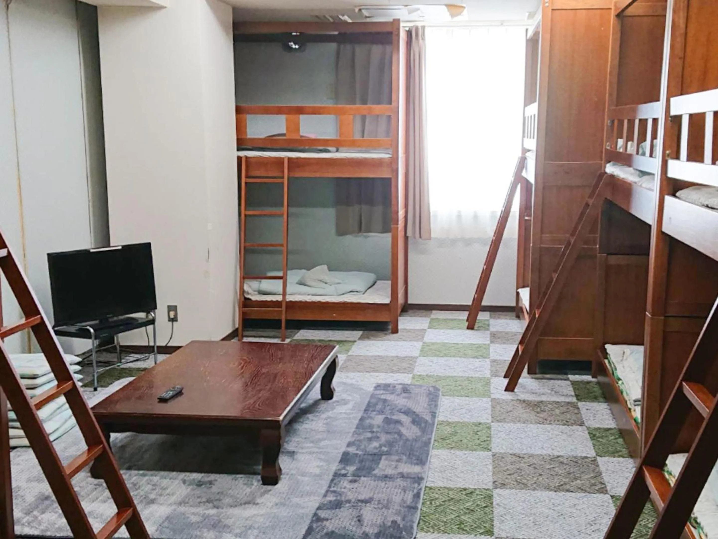 Photo of the whole room, Bed in Shiga Swiss Inn