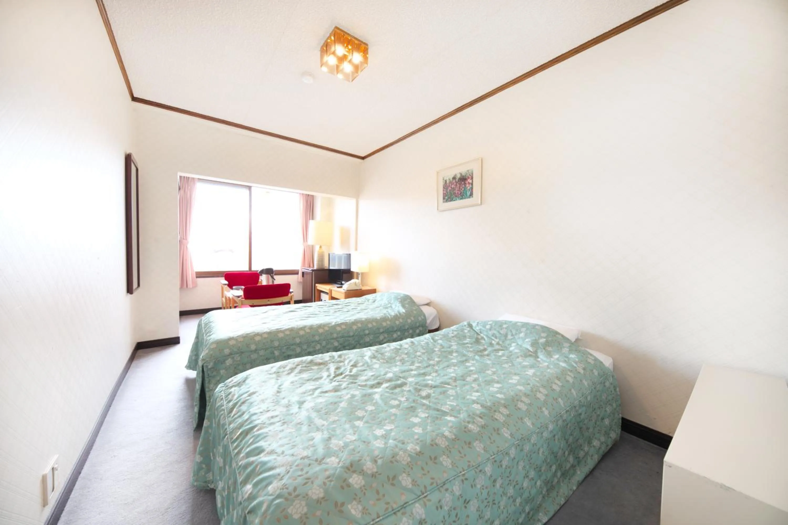 Photo of the whole room, Bed in Shiga Swiss Inn