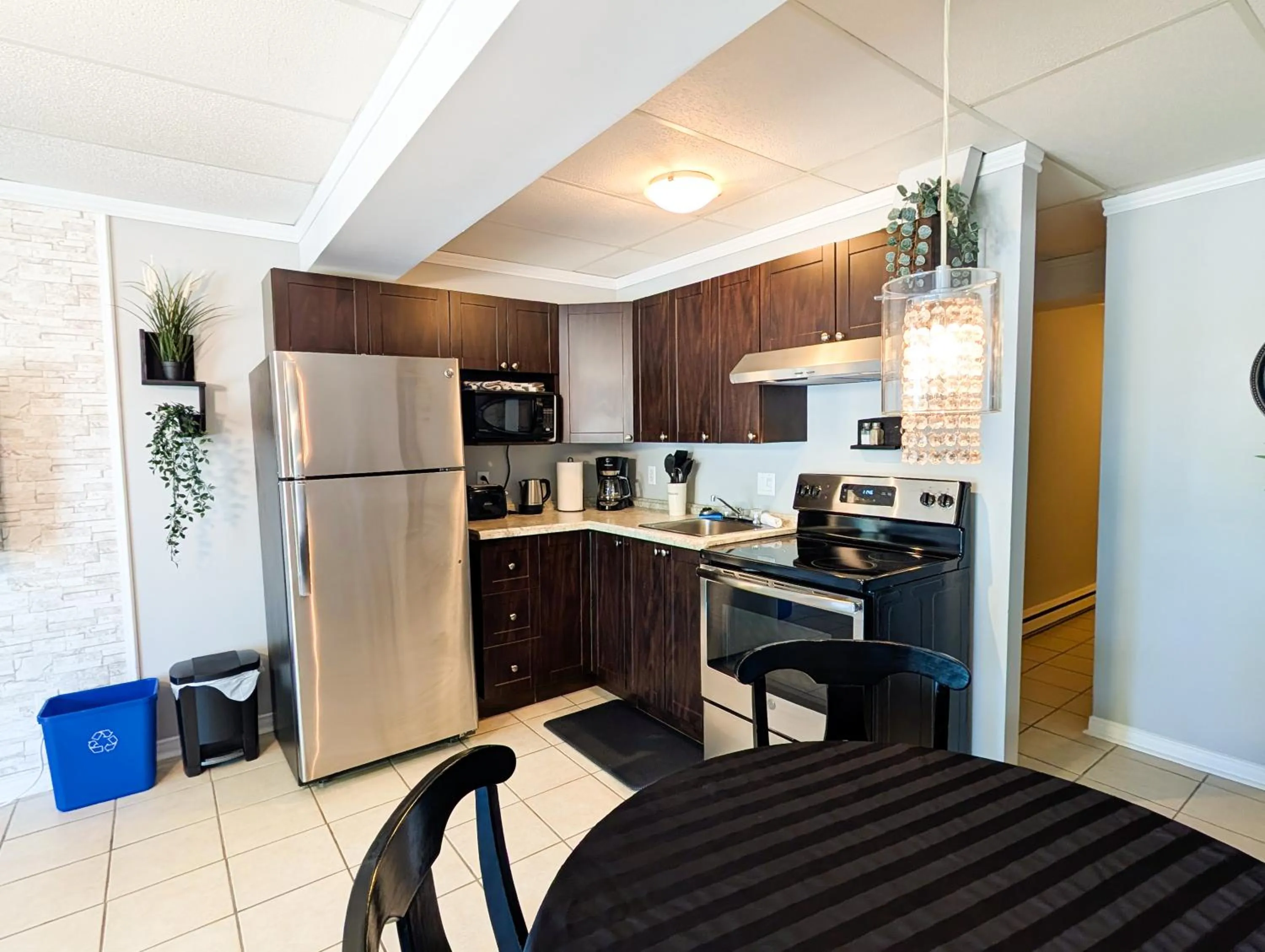 Kitchen or kitchenette in Hébergement Harvey