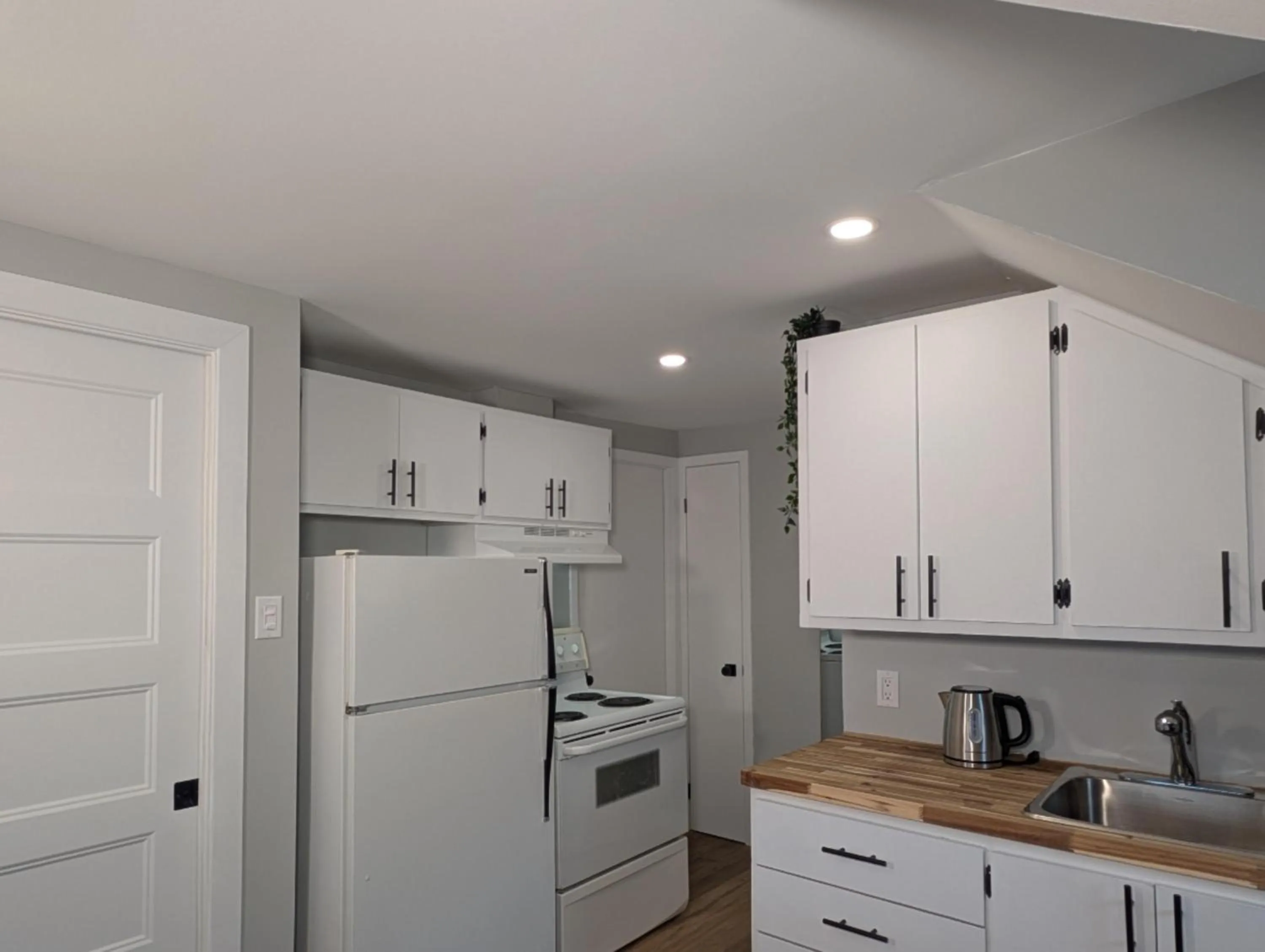 Kitchen or kitchenette in Hébergement Harvey