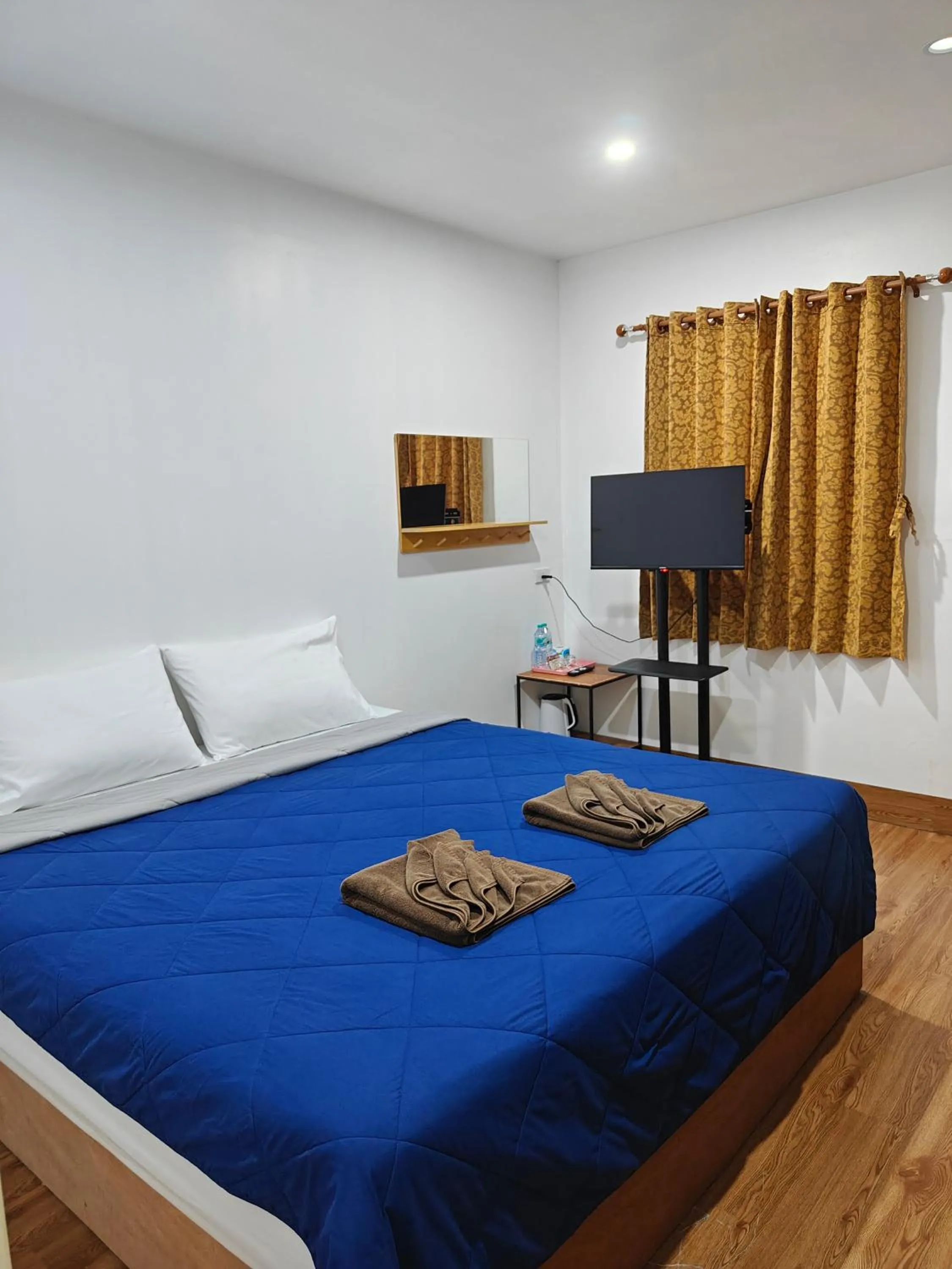 Bed in Aladdin Guest House