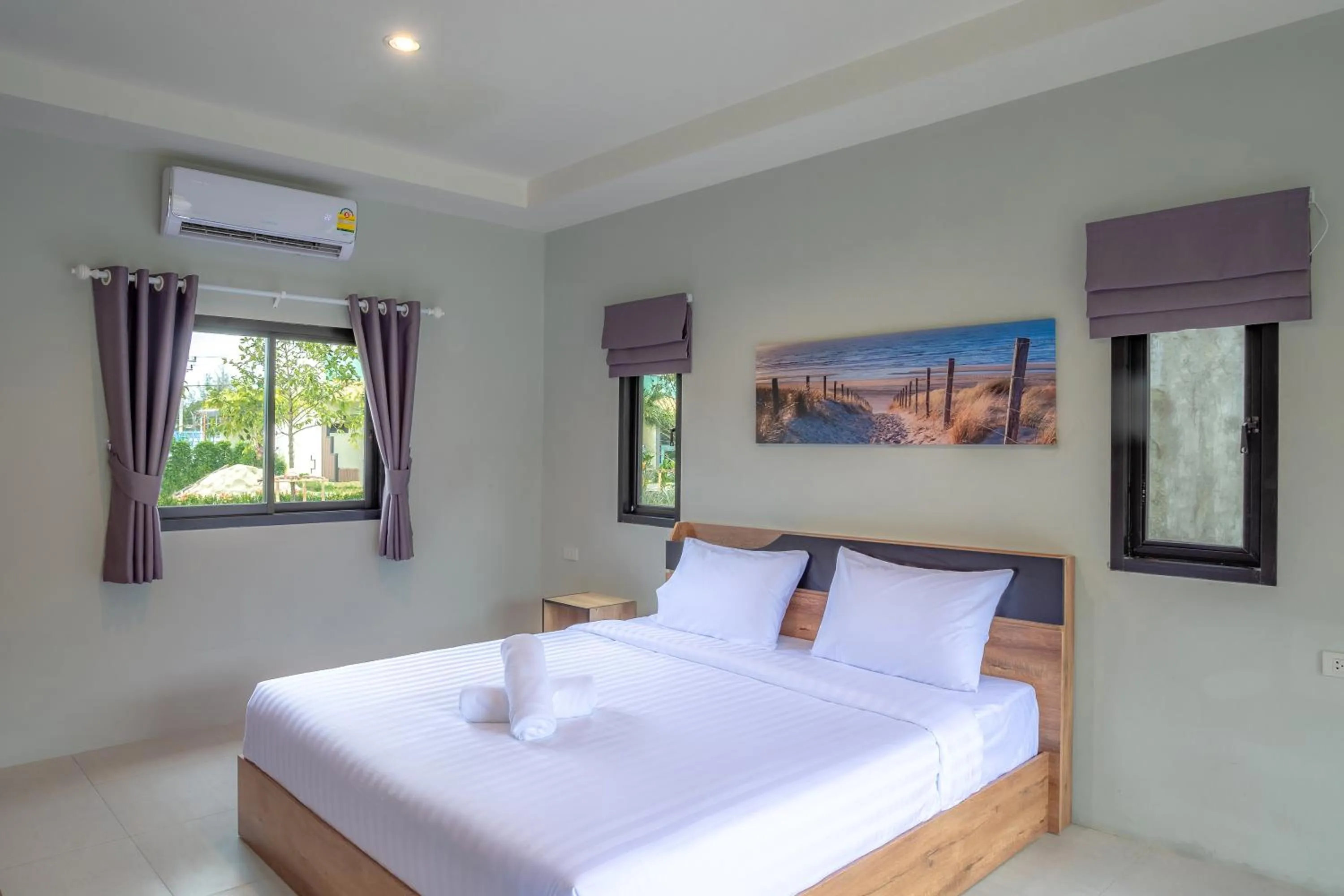 Bed in Malinee Resort