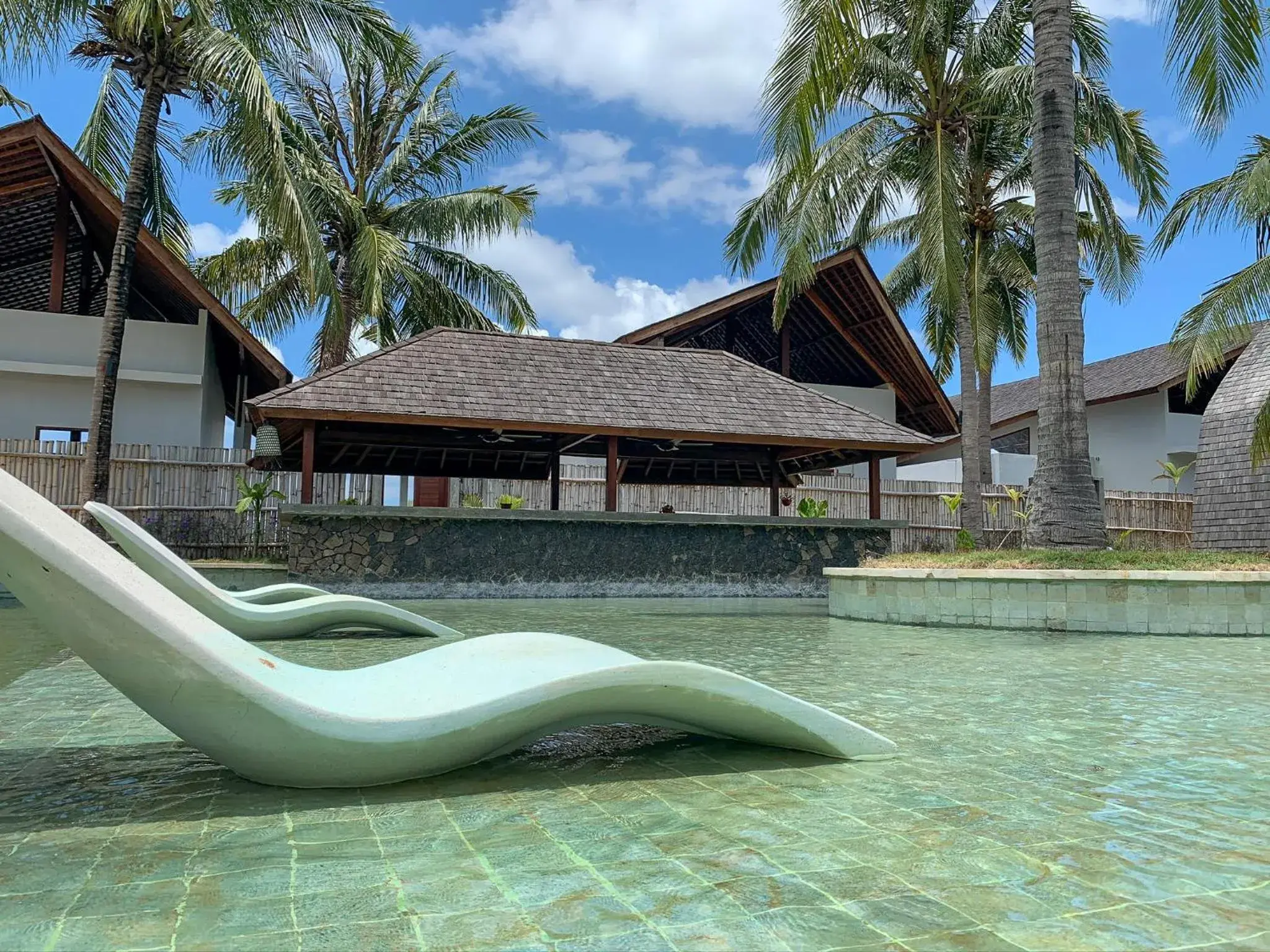 Pool view in The Club Villas Lombok Pool view in The Club Villas Lombok