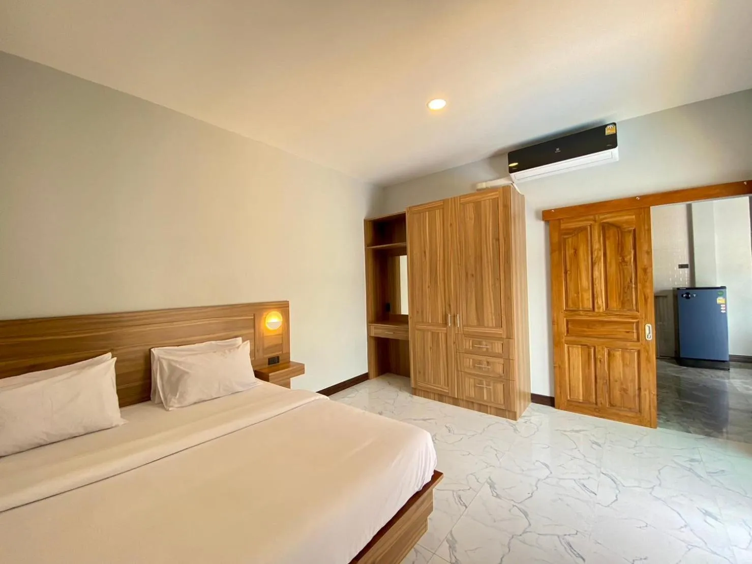 Bed in Blue Aura Pool Villa