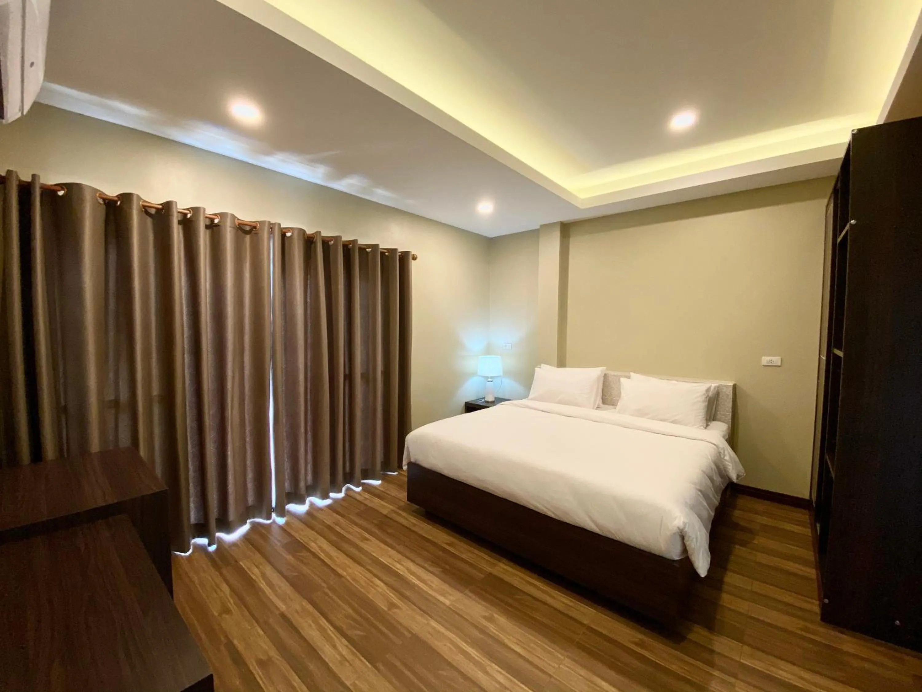 Bed in Blue Aura Pool Villa