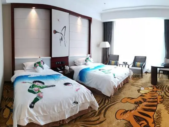 Bed in Binhai Jinling International Hotel