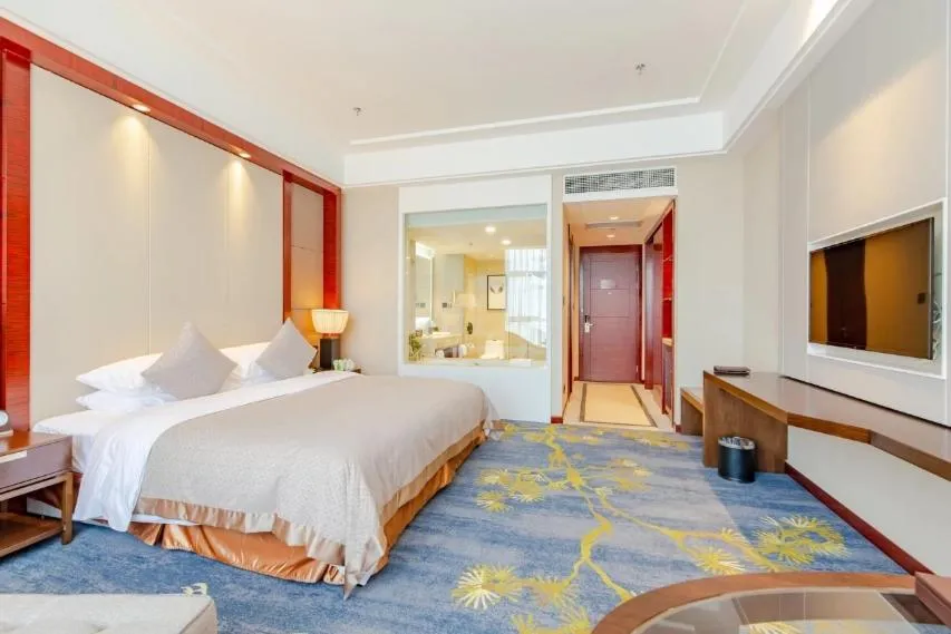 Bed in Binhai Jinling International Hotel
