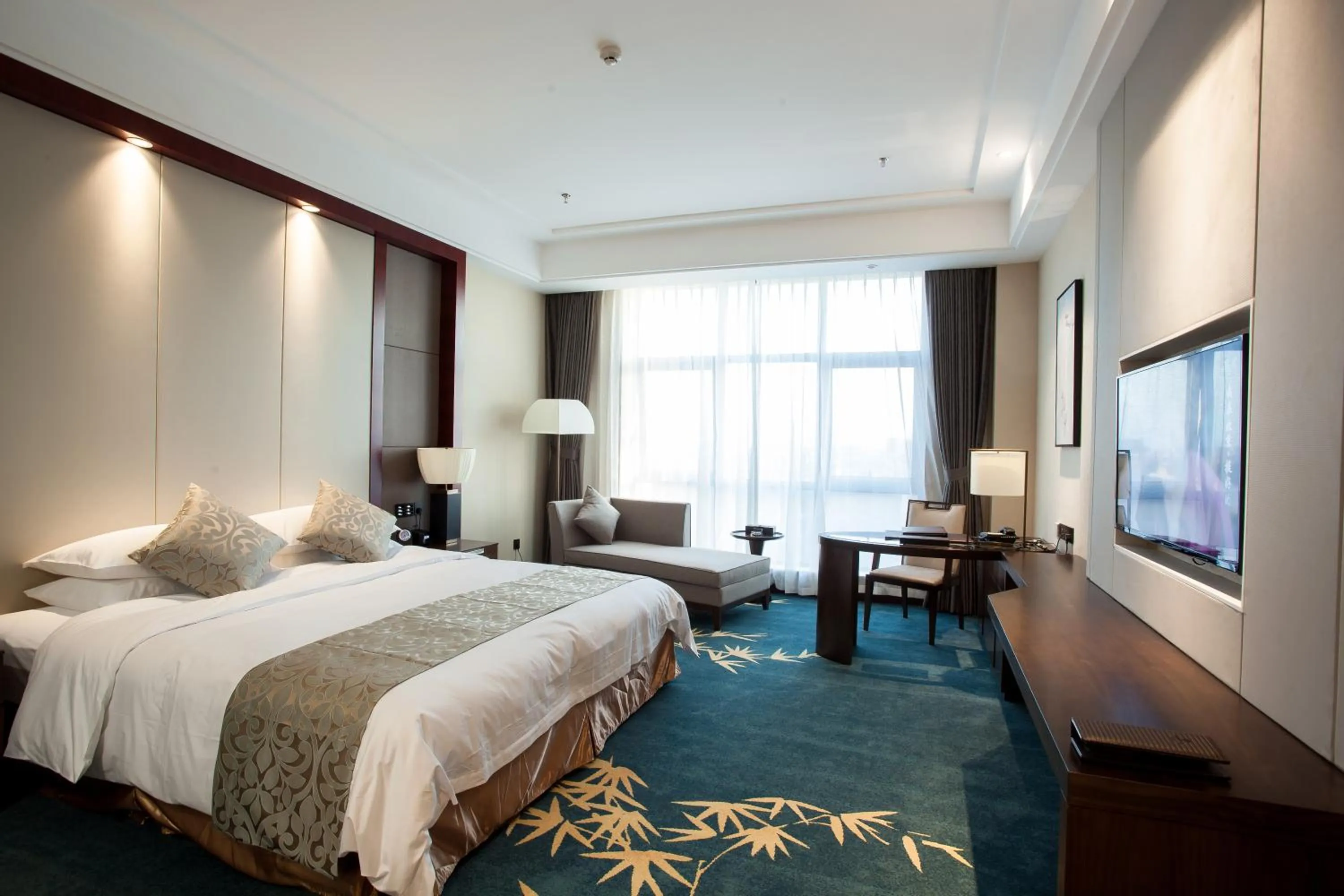 Bed in Binhai Jinling International Hotel