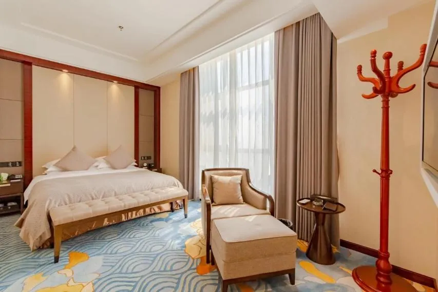 Bed in Binhai Jinling International Hotel