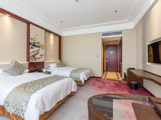 Bed in Binhai Jinling International Hotel