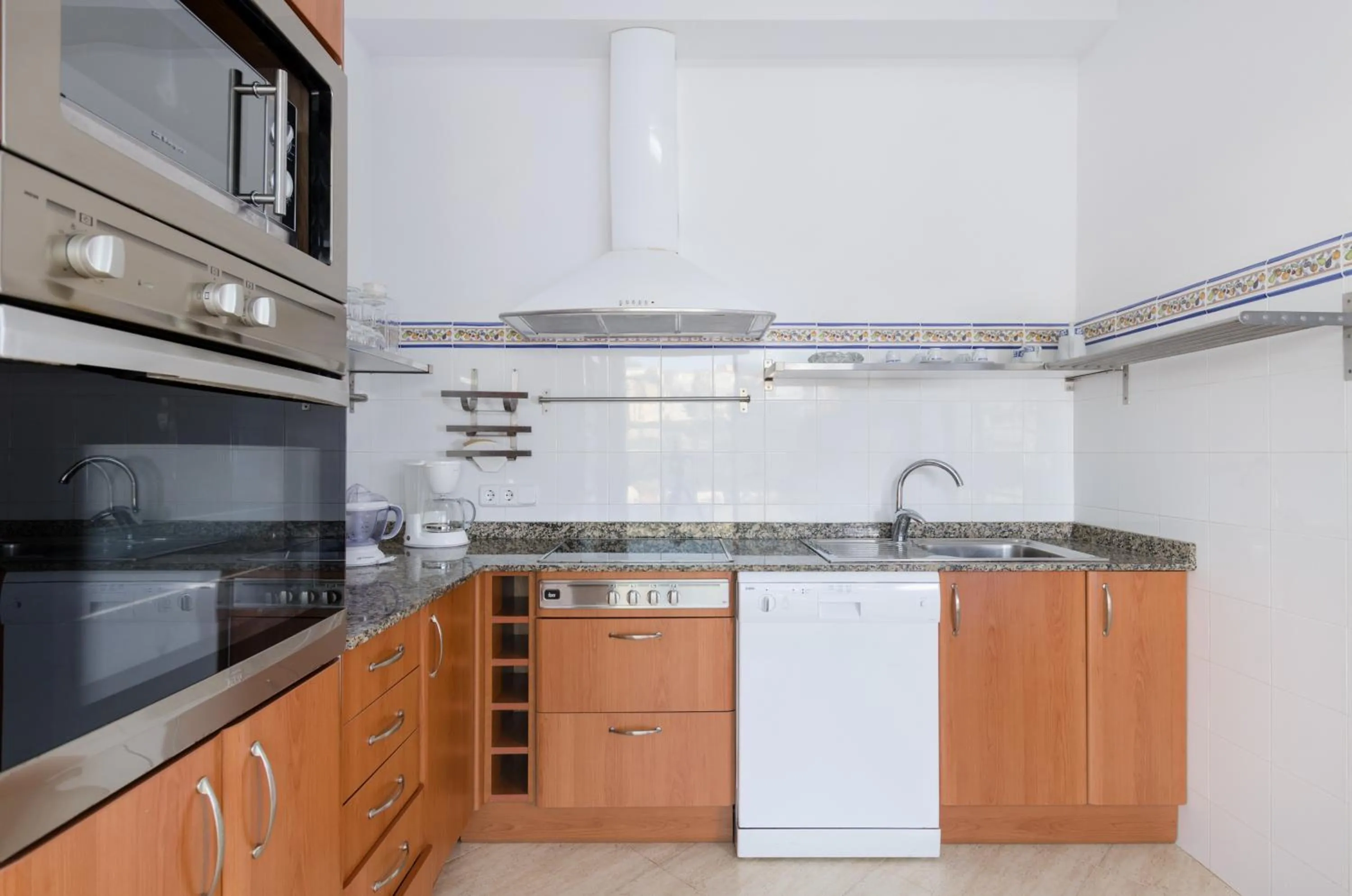 Kitchen or kitchenette in Bexan Cala Mandia