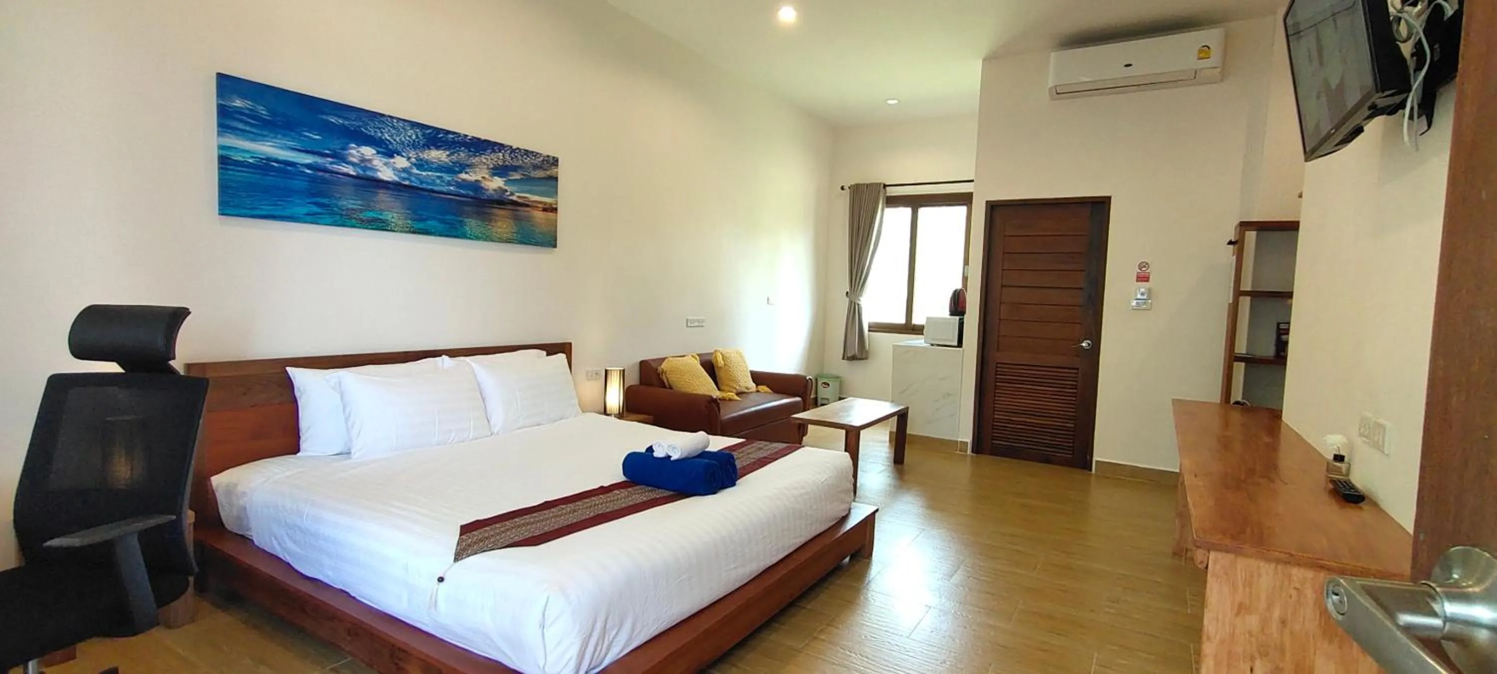 Bed in Le Grand Bleu Hotel