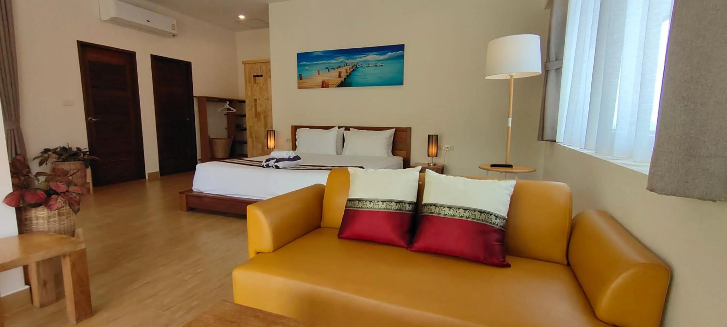 Bed in Le Grand Bleu Hotel