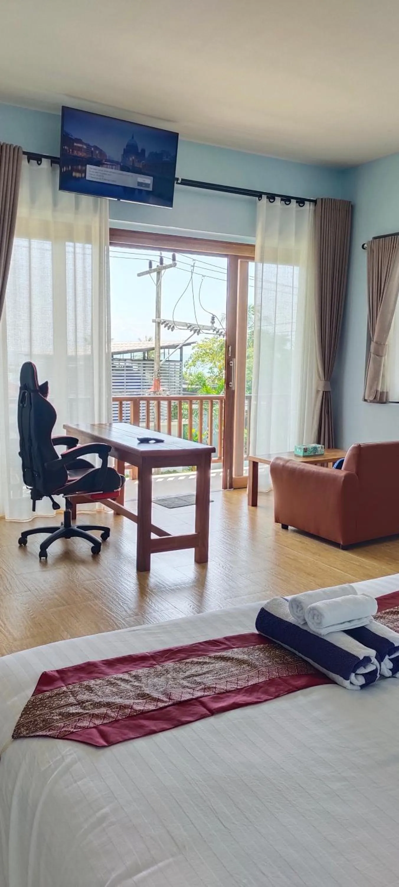 Bed in Le Grand Bleu Hotel