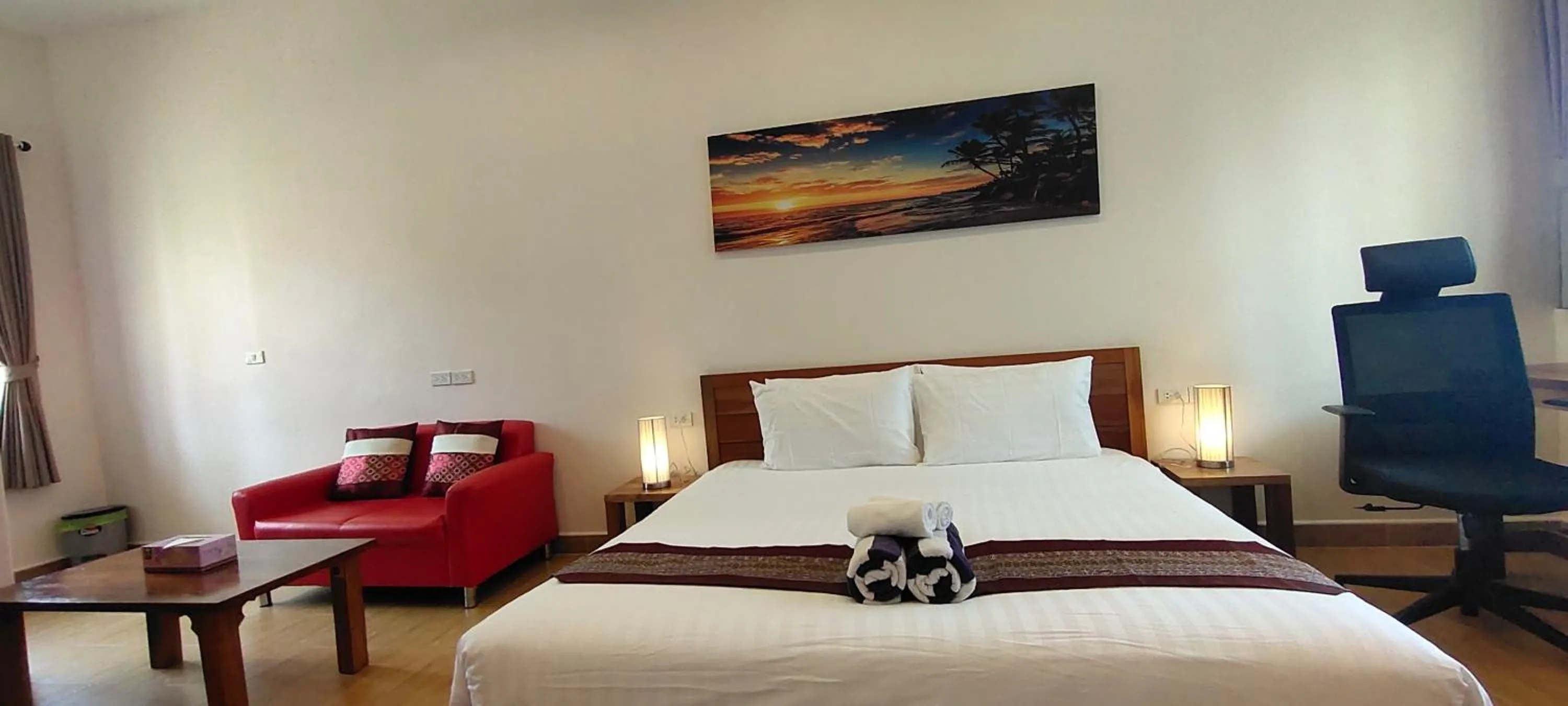 Bed in Le Grand Bleu Hotel